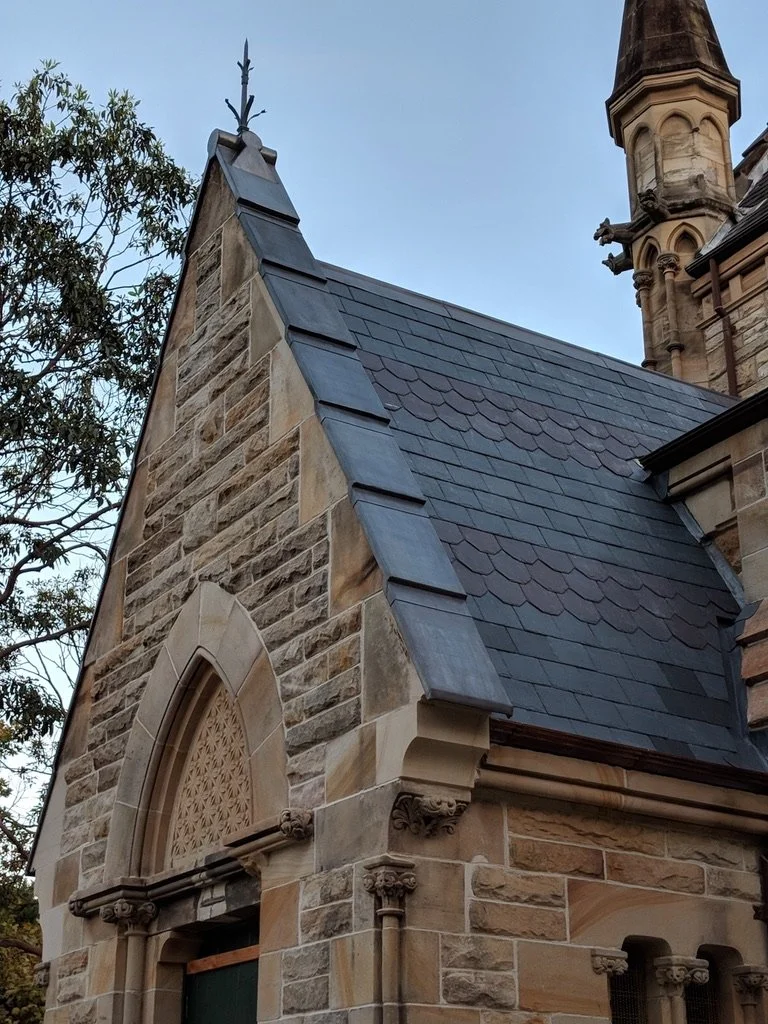 Lead capping on old sandstone church in Sydney
