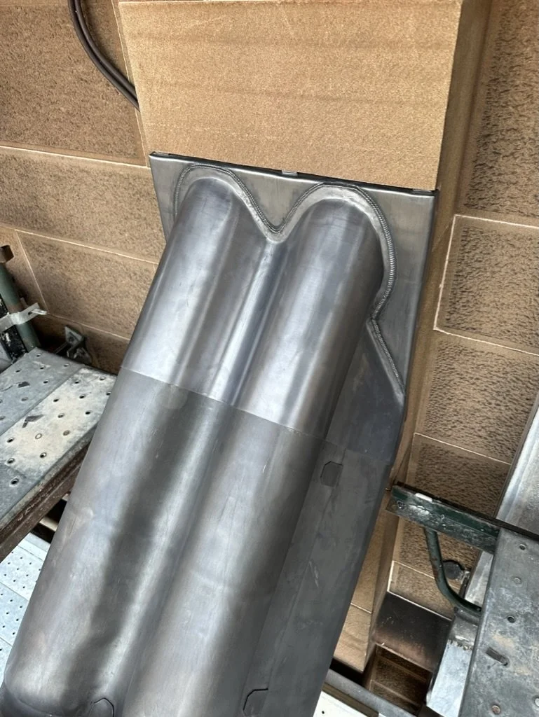 A bespoke lead flashing and weathering on sandstone building