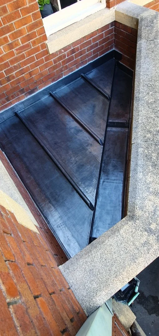 Lead roof and box gutter