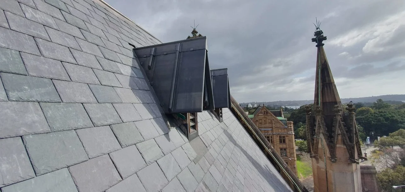 Lead dormer vents on slate roof