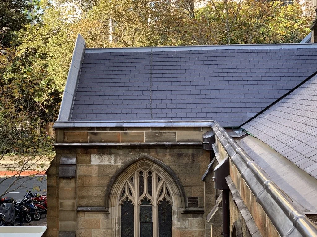 Lead parapet capping and lead weather on old church in centre of Sydney