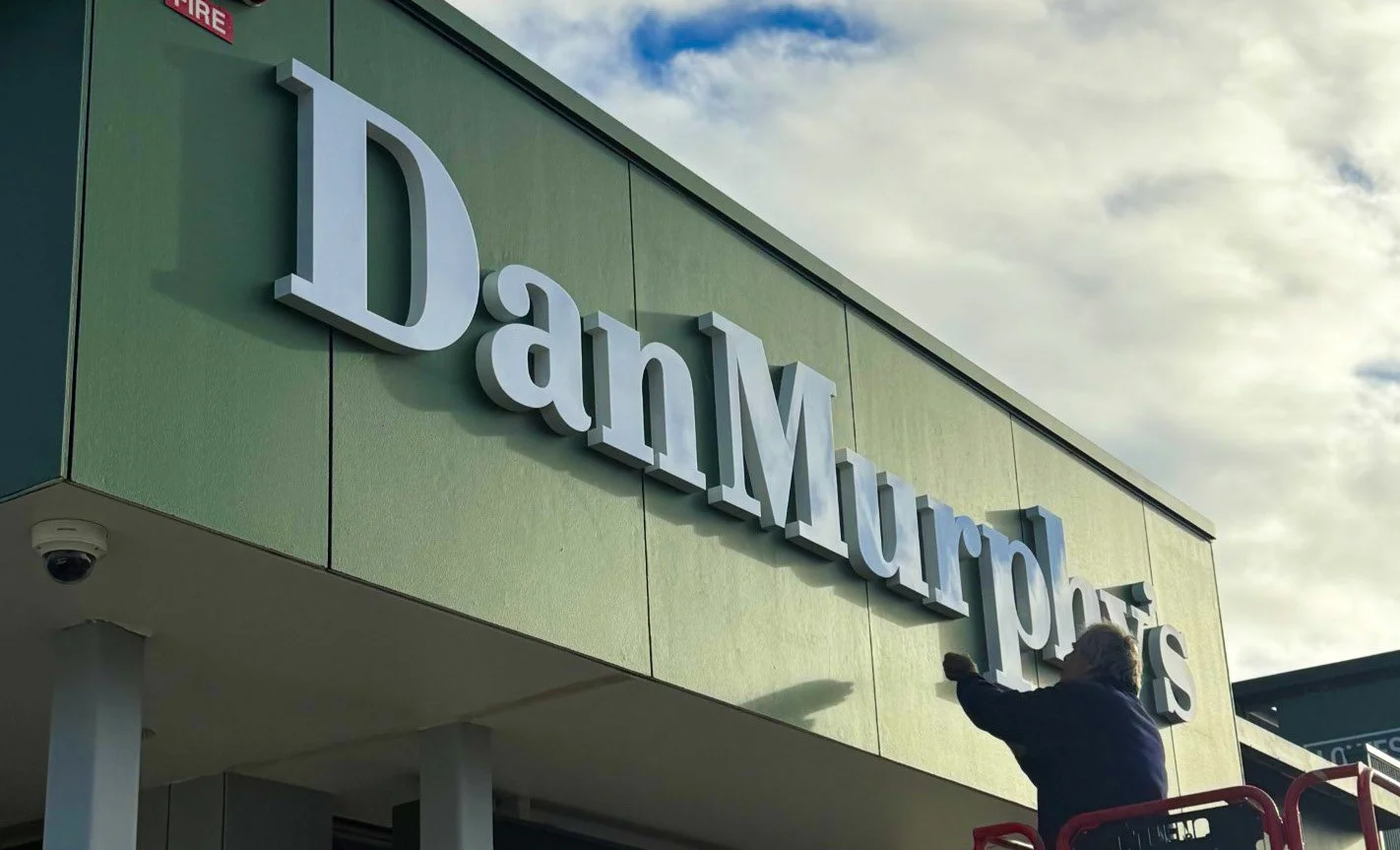 solutions-signage-dan-murphy-install-closeup.jpg