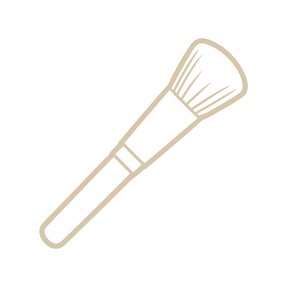 gold makeup brush to represent that the treatment helps with applying makeup