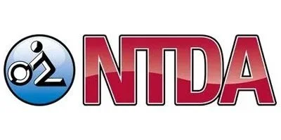 NTDA logo with a blue and white circular icon of a bicycle and skateboard.