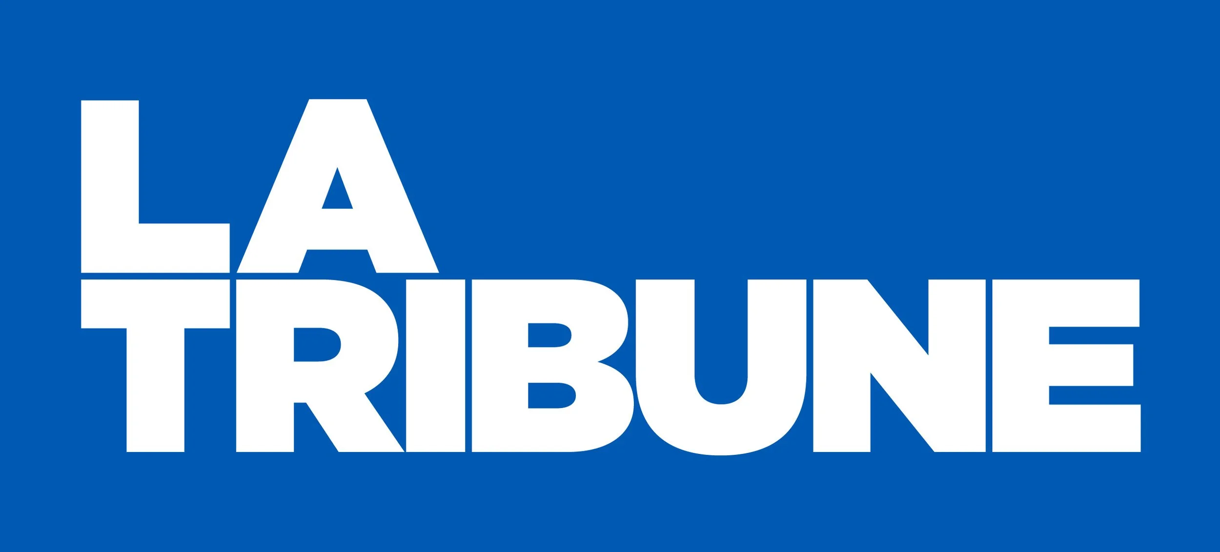 Graphic with blue background and white text that reads 'LA TRIBE'