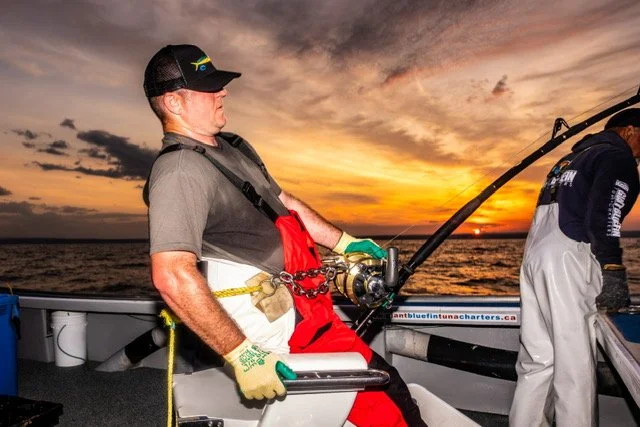 An angler doing battle with a giant bluefin tuna in Nova Scotia.