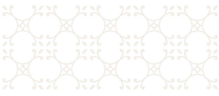 A decorative pattern with interlocking curved lines and floral elements in white on a black background
