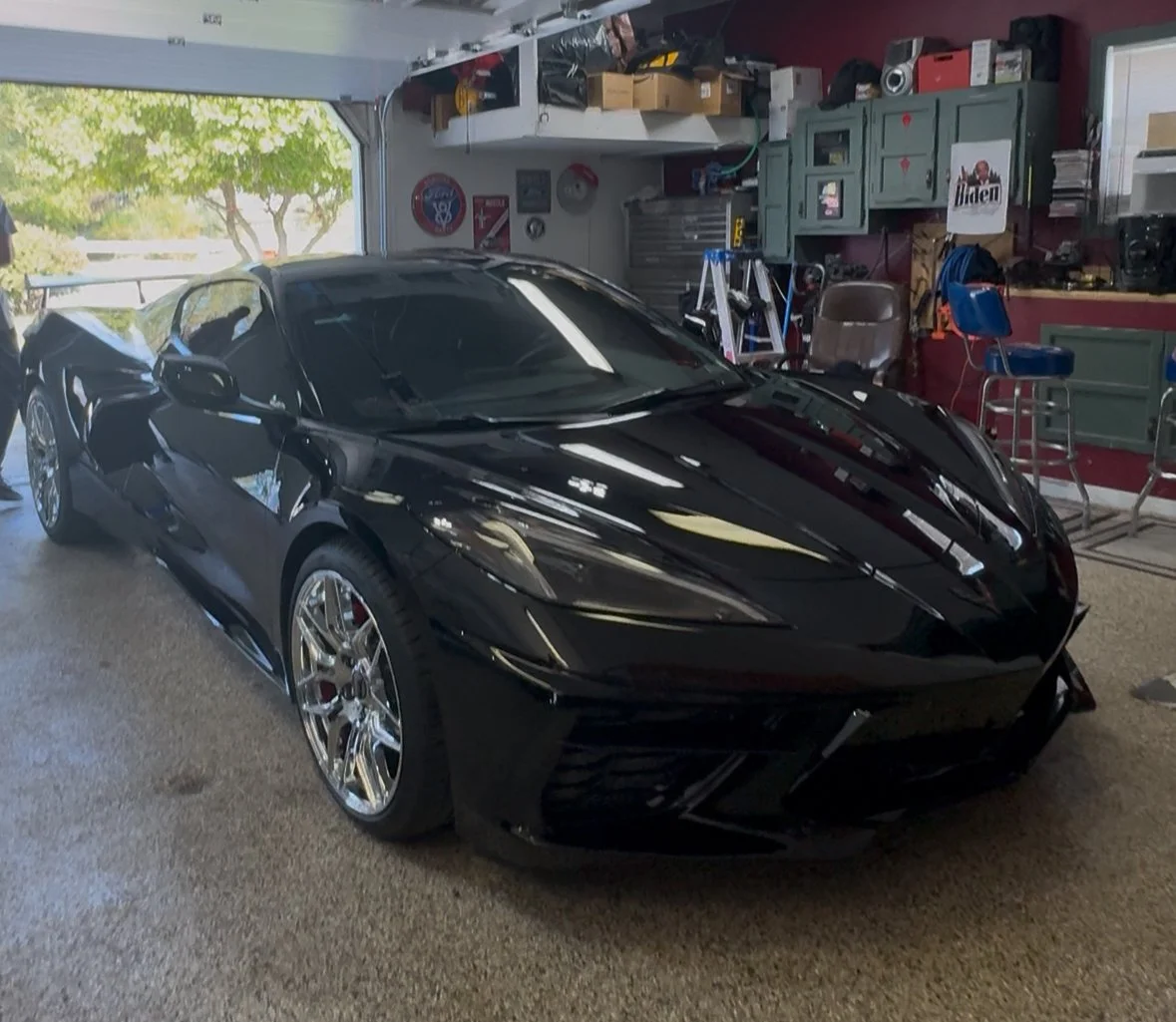 A black Corvette C8 that received an express polish and 5-year ceramic coating from David’s Auto Spa in St. Louis. The paint shows a sharp, mirror-like gloss with deep reflections after enhancing the surface and installing long-term ceramic protectio