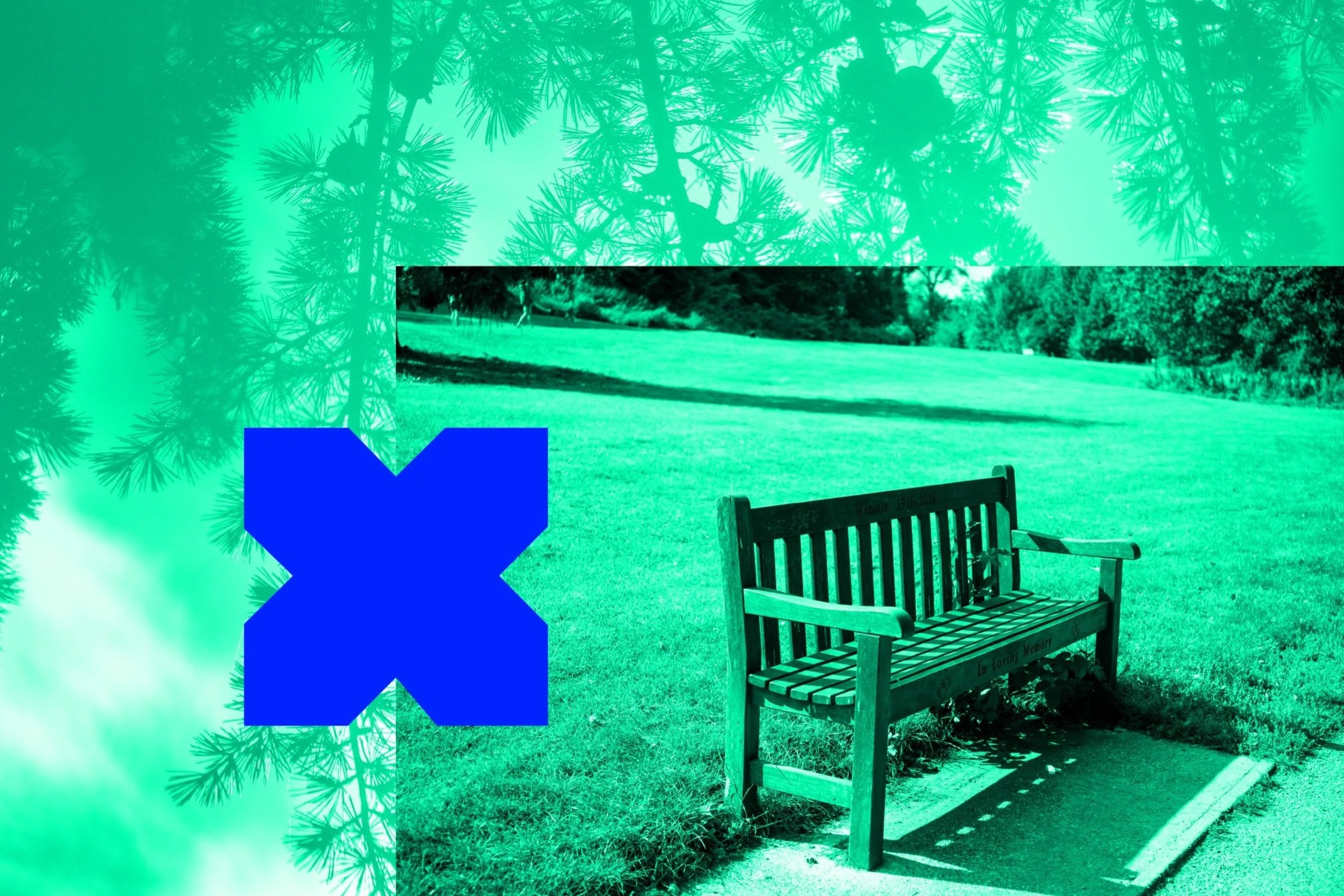 A park scene with a wooden bench on a concrete pad, grassy area, trees in the background, and overlay of a large blue X