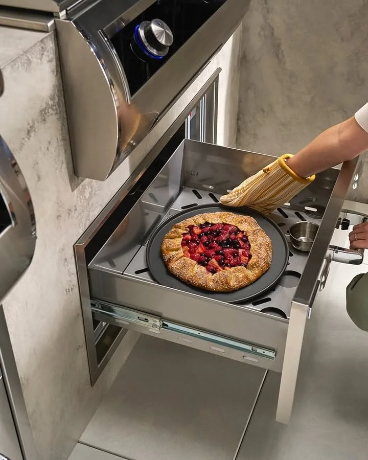 From golden pies to gourmet feasts under the stars, Fire Magic luxury grills and accessories are designed to take your outdoor entertaining to dazzling new heights. ✨ 

Innovation meets elegance with every detail - like this warming drawer that keeps