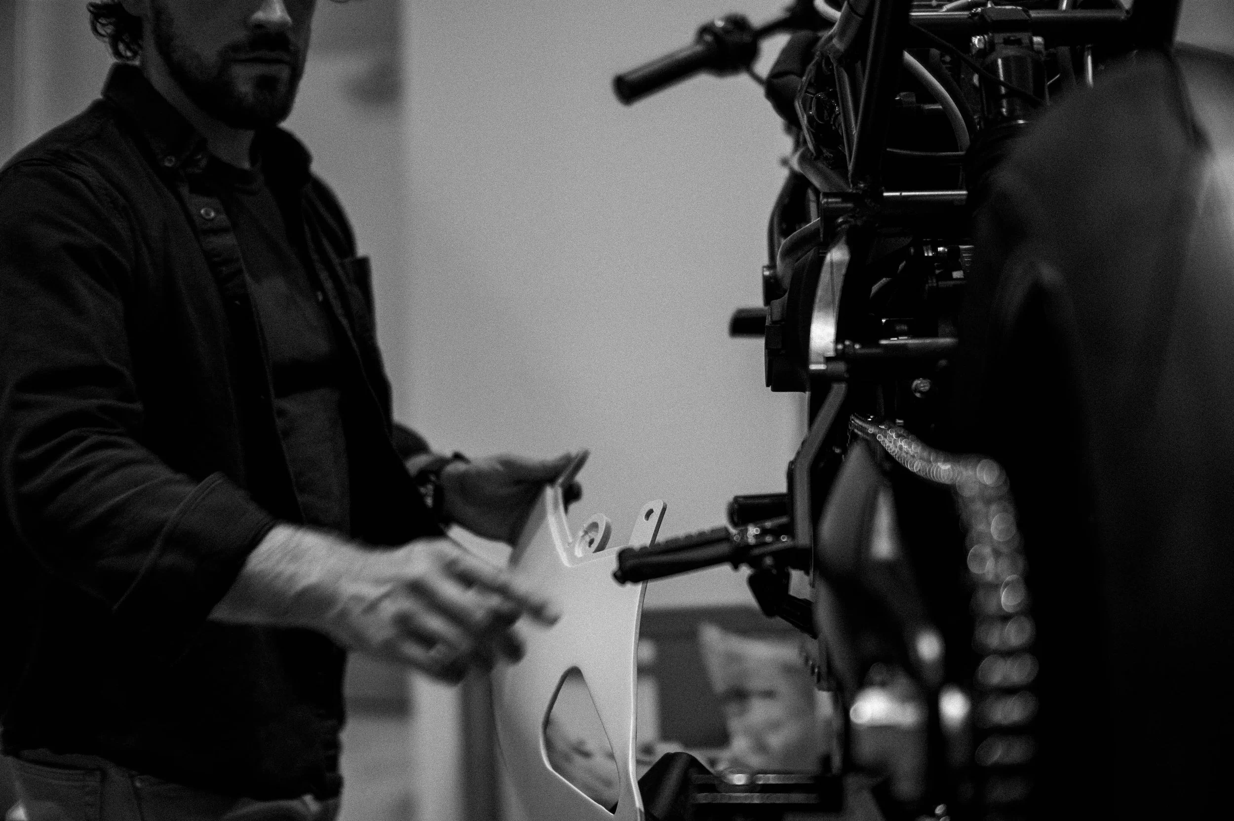 Trent Dingman affixing a body panel to a Project : ARES prototype