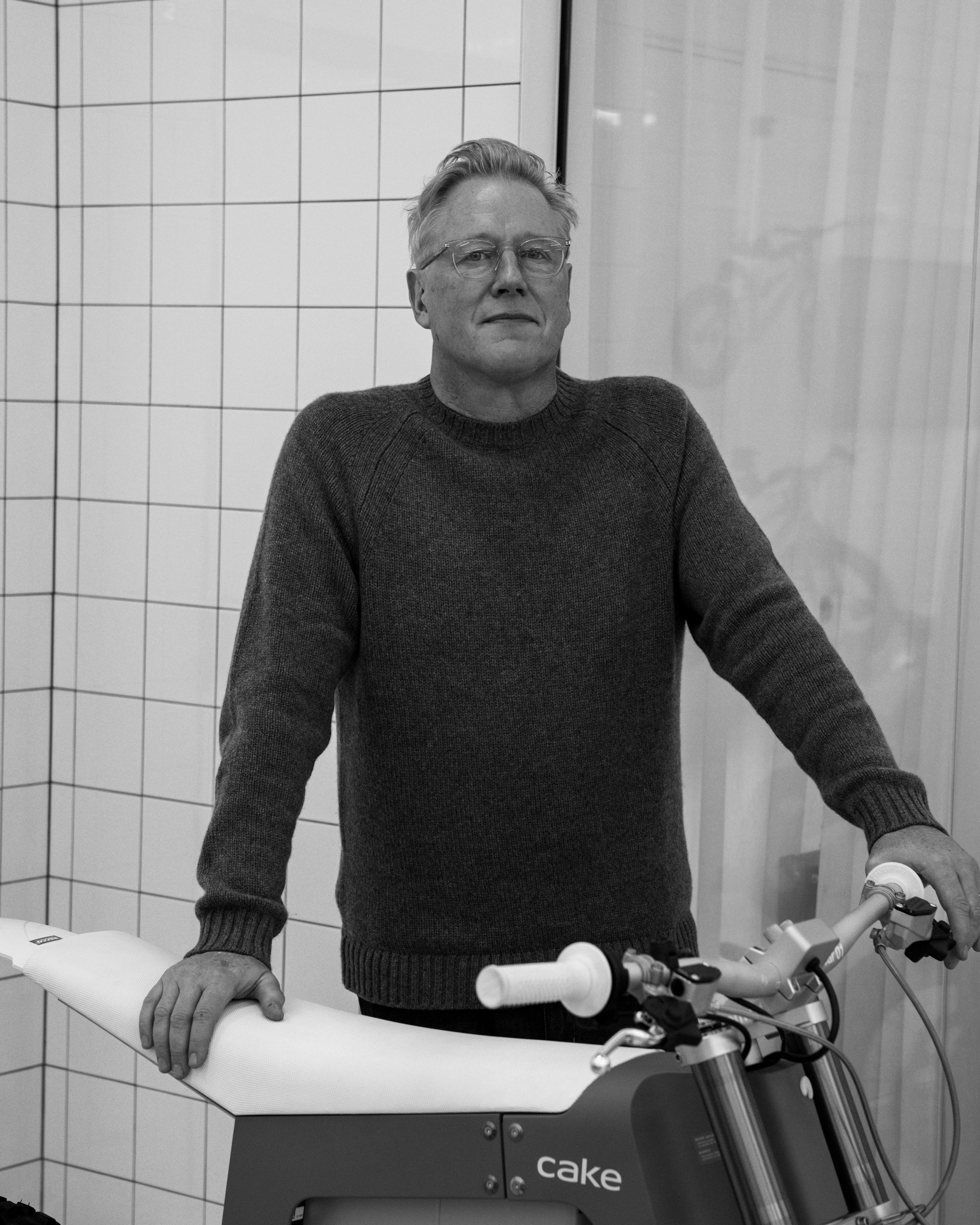 Stefan Ytterborn posing in front of a CAKE motorcycle