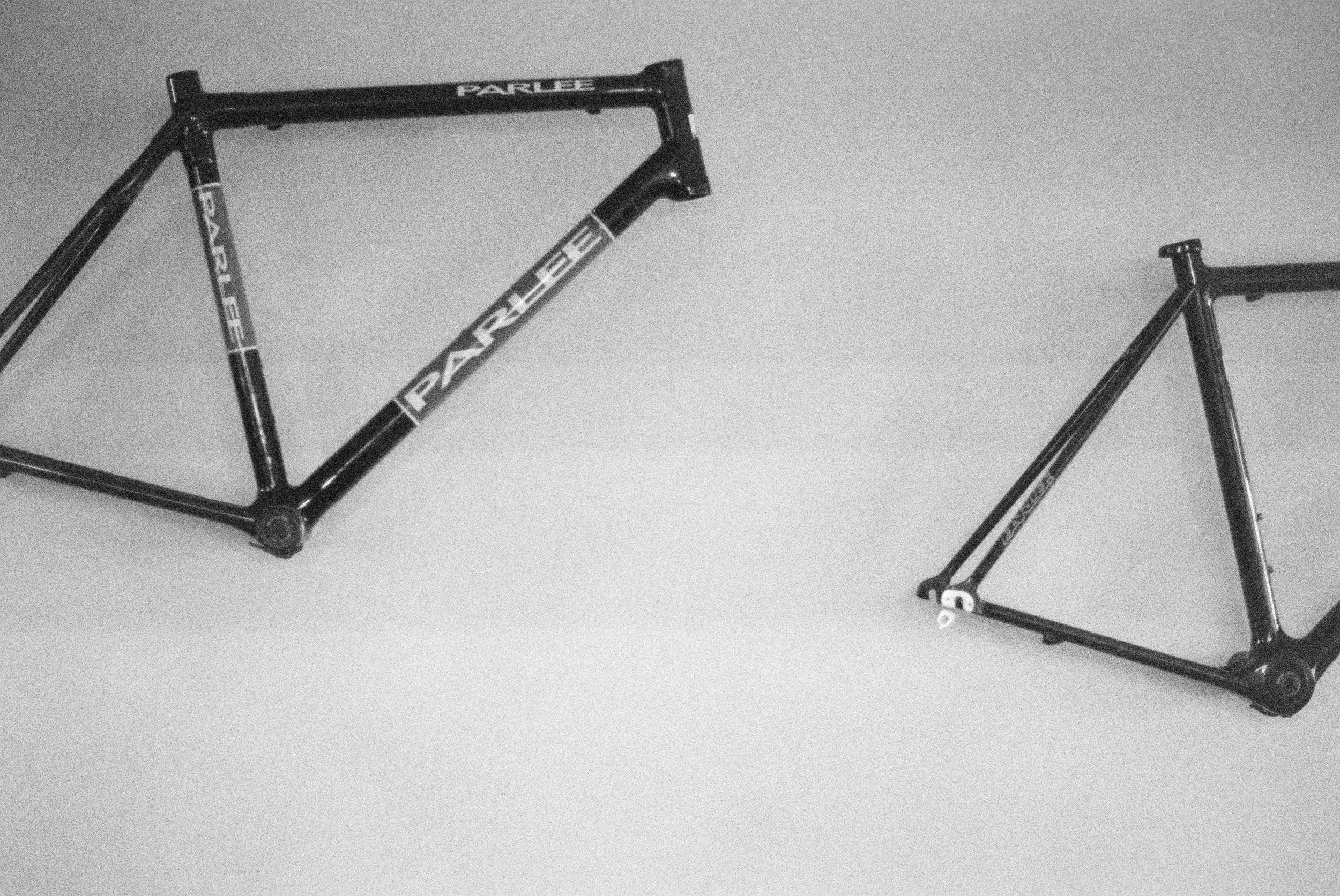Classic Parlee frames hung on the wall at Parlee Headquarters