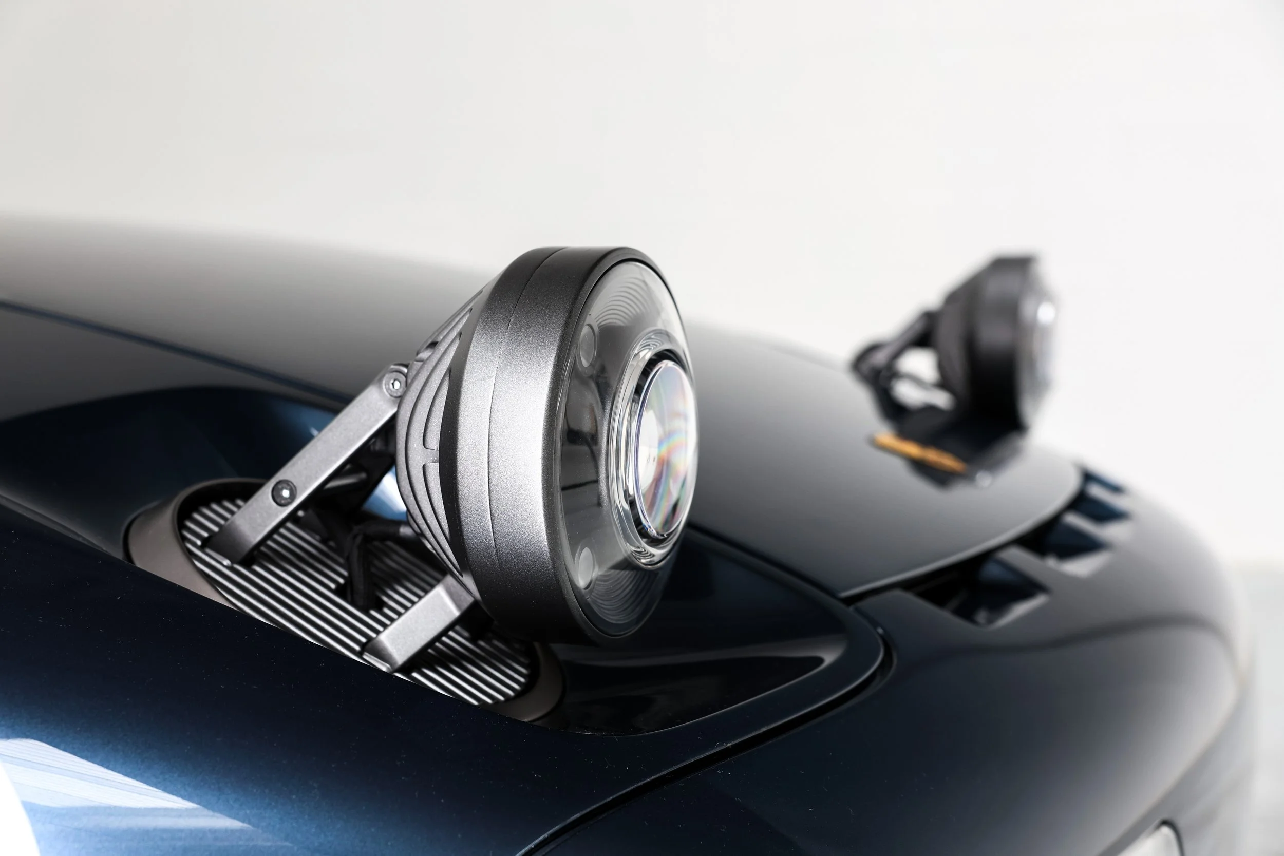 A closeup of the Nardone 928 headlights