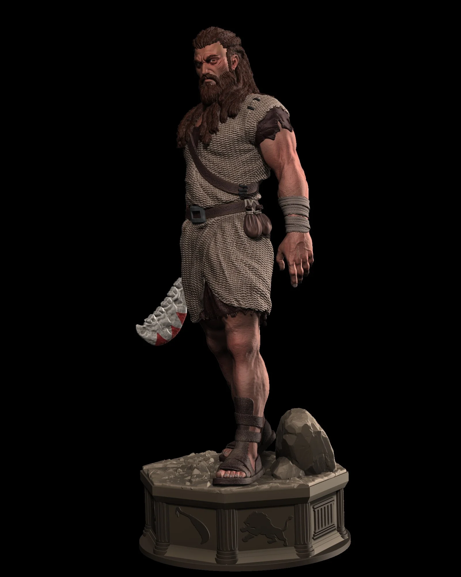 A detailed, life-sized statue of a man with long hair and a beard, dressed in primitive tribal attire, standing on a decorated base with rocks and carvings.