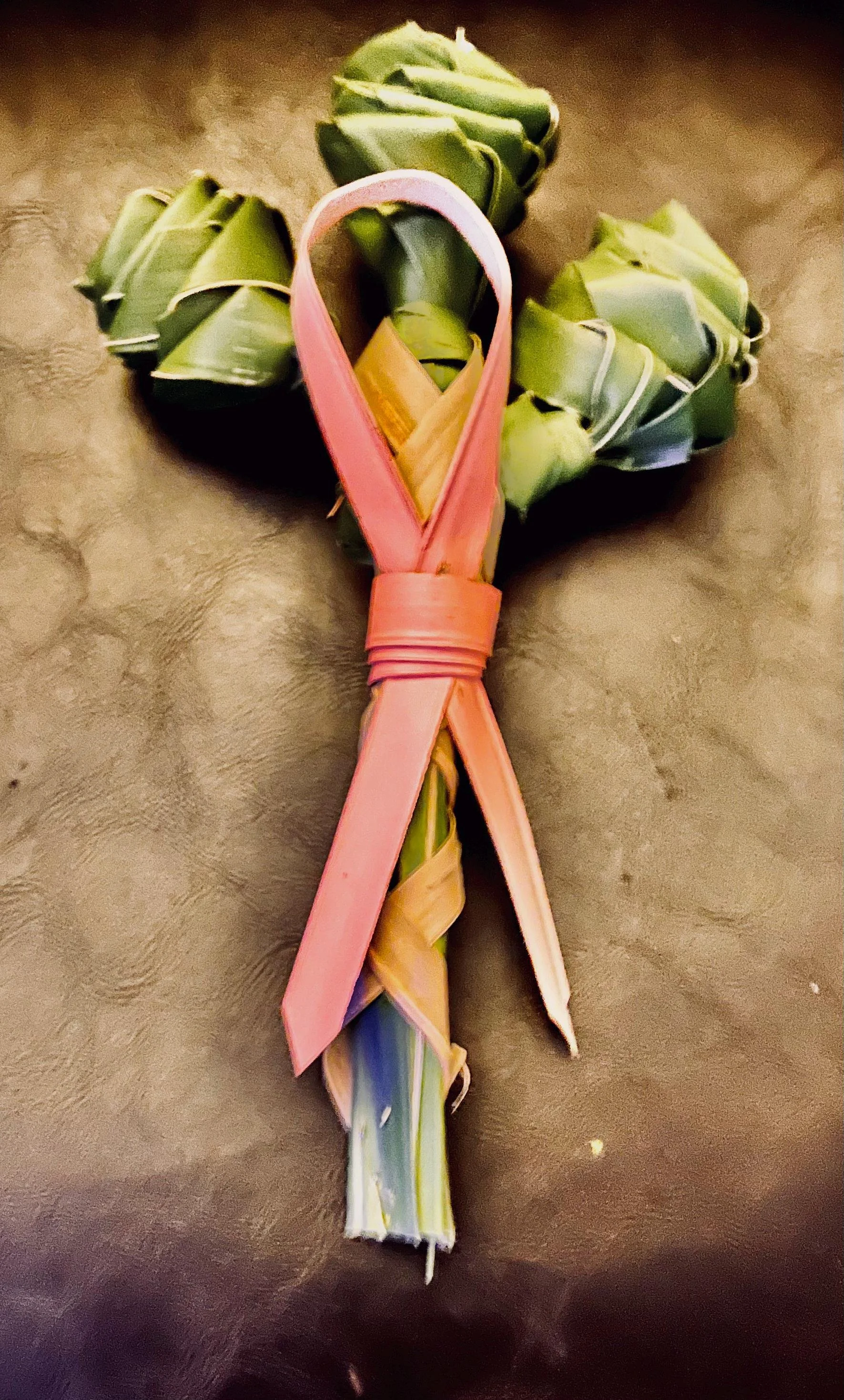 Three handwoven palm roses with pink ribbon hope faith courage keepsake