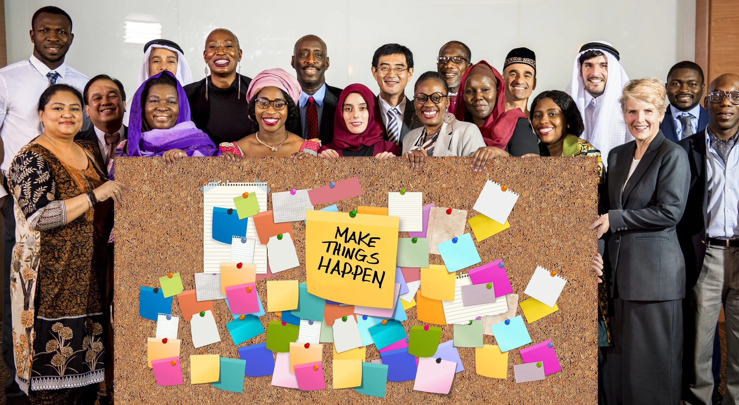 A diverse group of professionals holding a large corkboard with colorful sticky notes and a yellow note that says 'Make Things Happen' in an office setting.