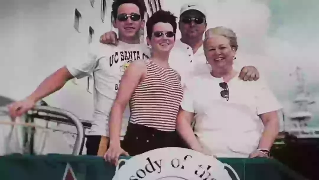 Silhouette of a person's face and shoulders illuminated from behind, creating a backlit effect.