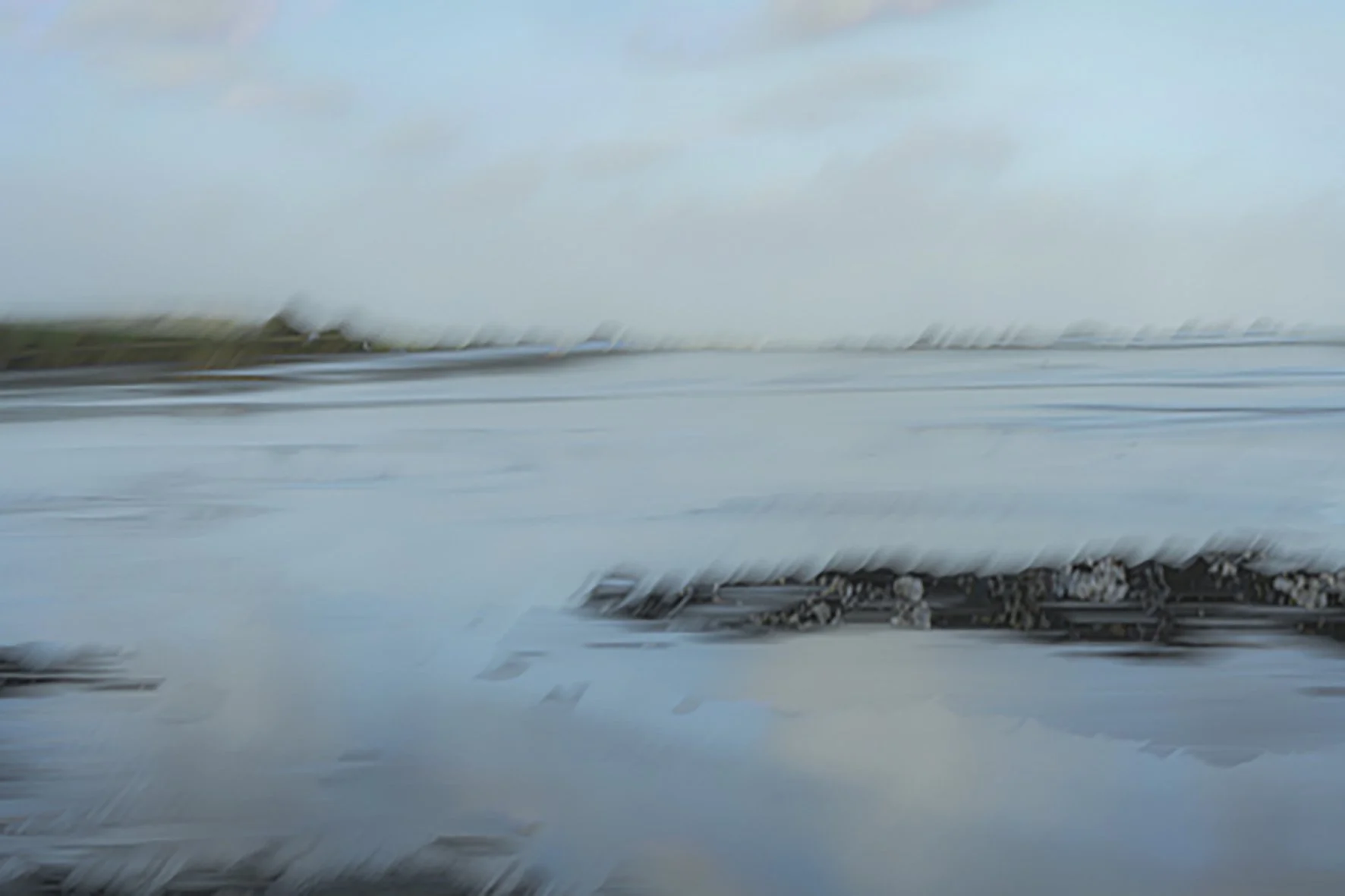 subjective-view-connemara-blue a wet sand with a thin covering of water catching the colours and reflections of the sky by Frankie McAllister