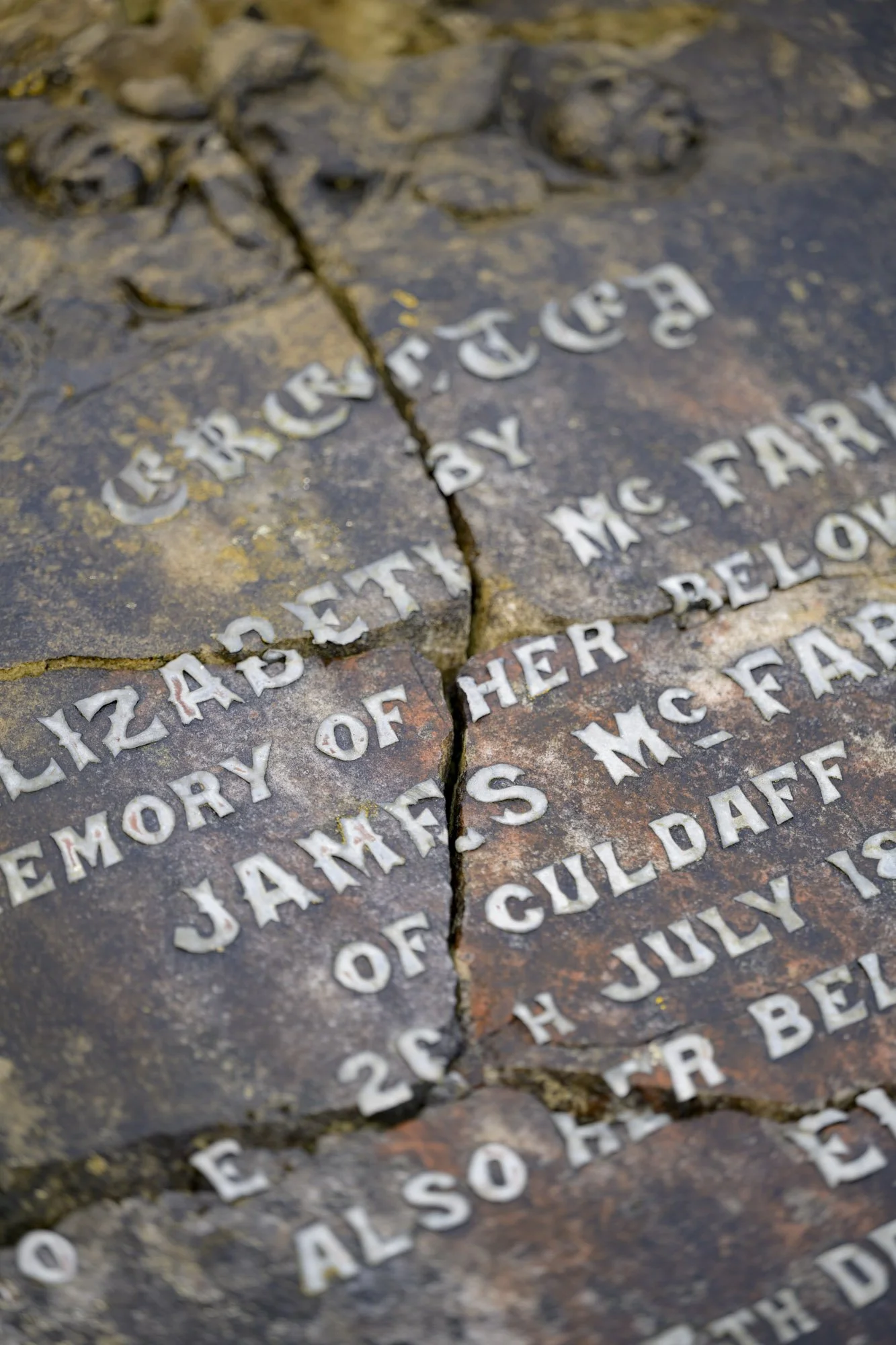 Dividing Lines 6 - old cracked gravestones