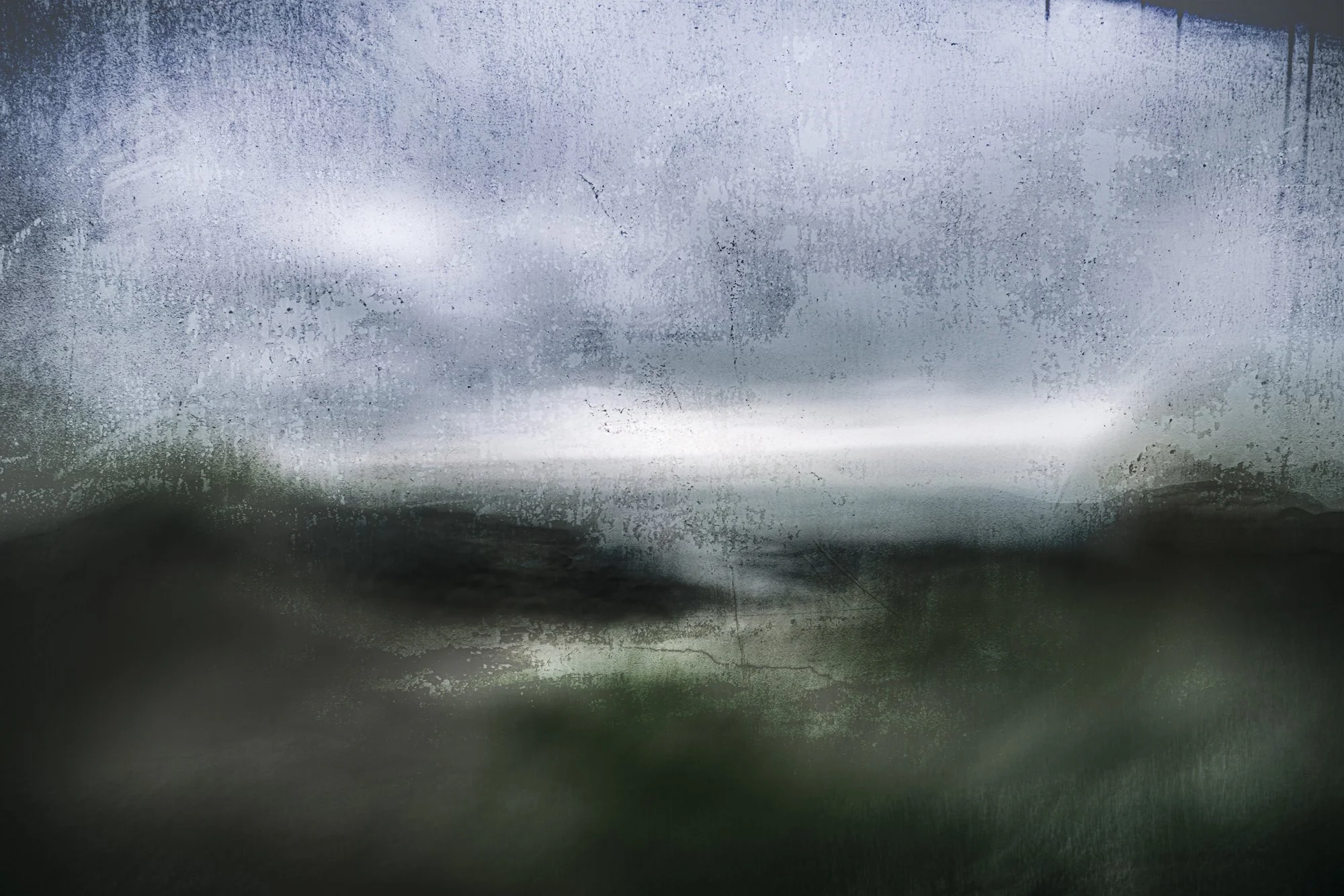 subjective-view-Northumbria a moody grey blue sky over seagrass covered sand dunes, and the grey sea in the distance