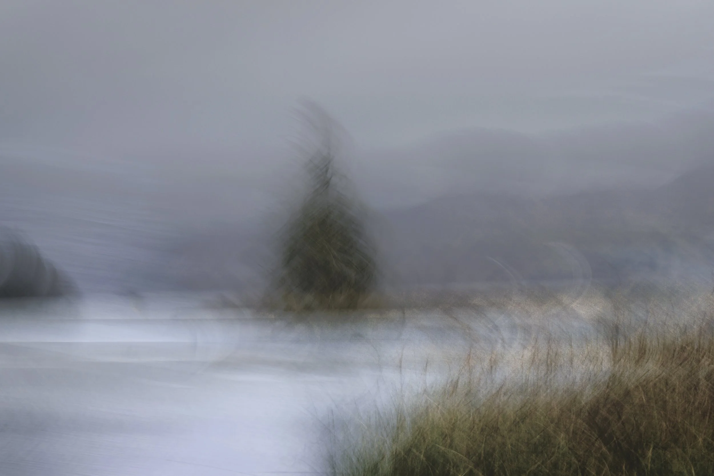 Dividing Lines 2 Loch Eske impressionist scene of a blurry misty lake with fir tree in distance
