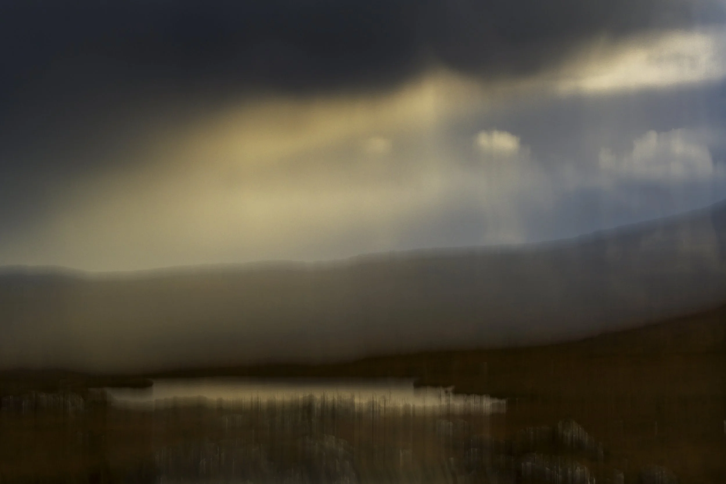 subjective-view-connemara a hazy brown blue and golden sky, after the rain, above the bogs of Connemara