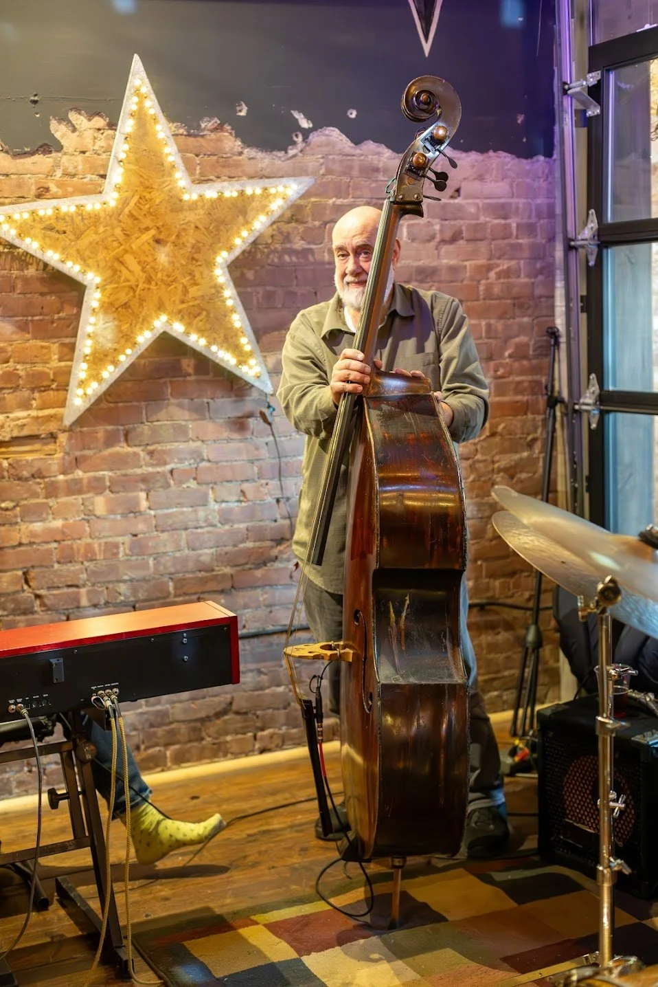 Upright bass player Tony Marino performing live jazz in Honesdale PA at Here & Now Brewing Company.