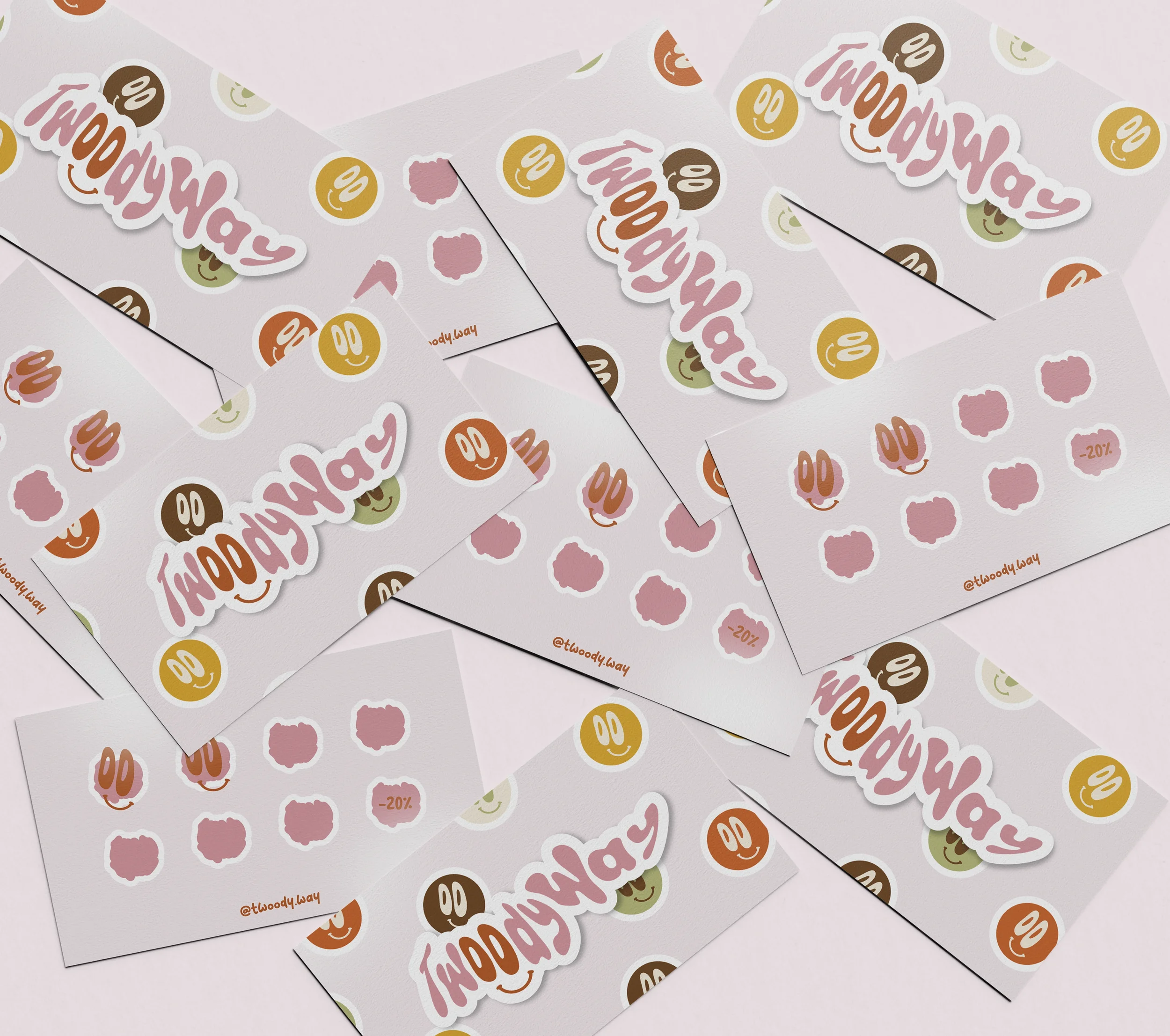 Multiple sheets of stickers with the text 'Twoody Way', smiley face emojis, cloud-like shapes, and a 20% discount label, scattered on a light pink background.