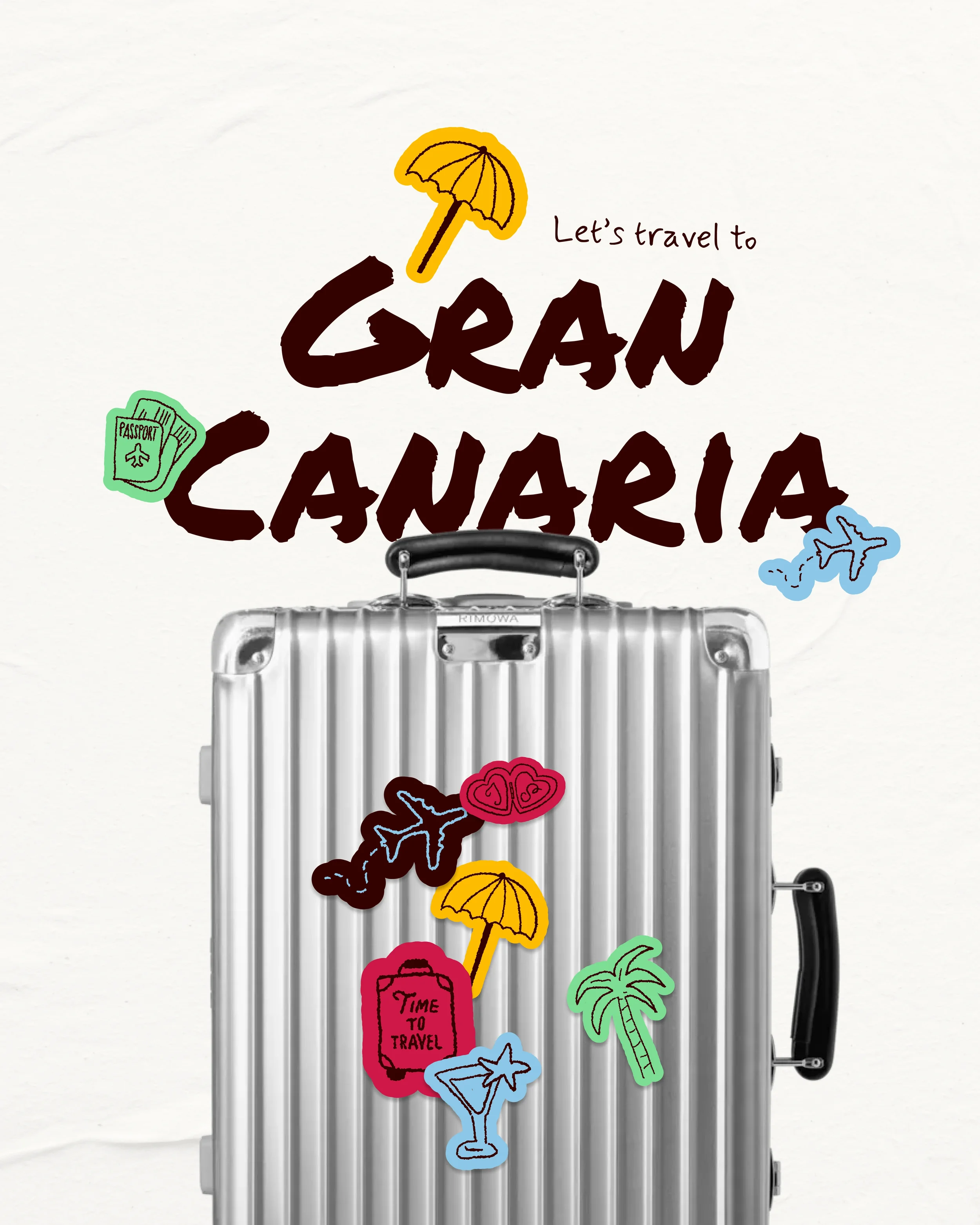 Une valise en aluminium avec des autocollants colorés représentant des éléments liés aux voyages, comme un parasol, une empreinte de pas, un passeport, un avion, une bouteille de voyage, un cocktail, et un palmier. Il y a également un texte mentionnant "Let's travel to GRAU CANARIA".