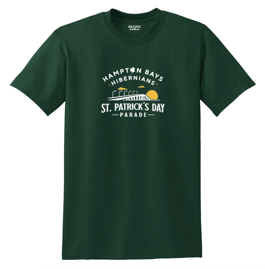 Green T-shirt with a design that says 'Hampton Bays Hibernians' and 'St. Patrick's Day Parade' along with a graphic of a bridge, the sun, and flags.