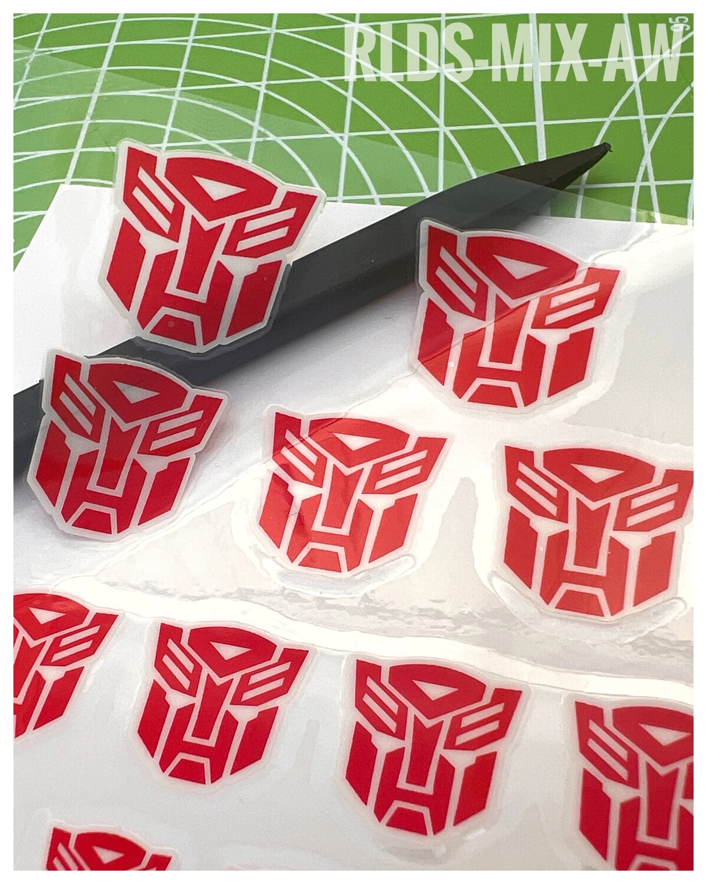 94 x Bot dry rub transfers, including 12 x split logos, Red with White background.