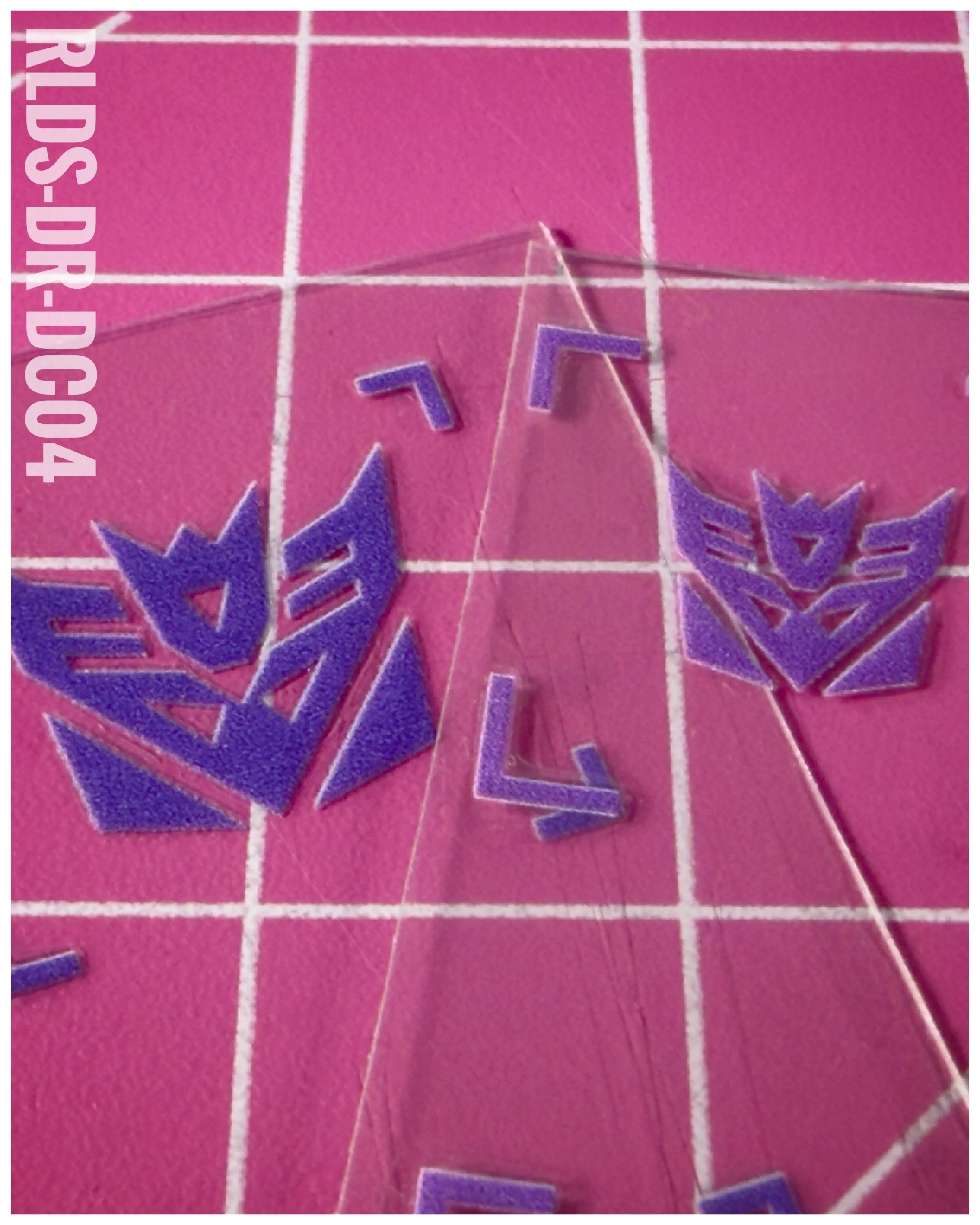 40 x Con UV DTF dry rub transfers, Toon Style, Purple with Clear background.