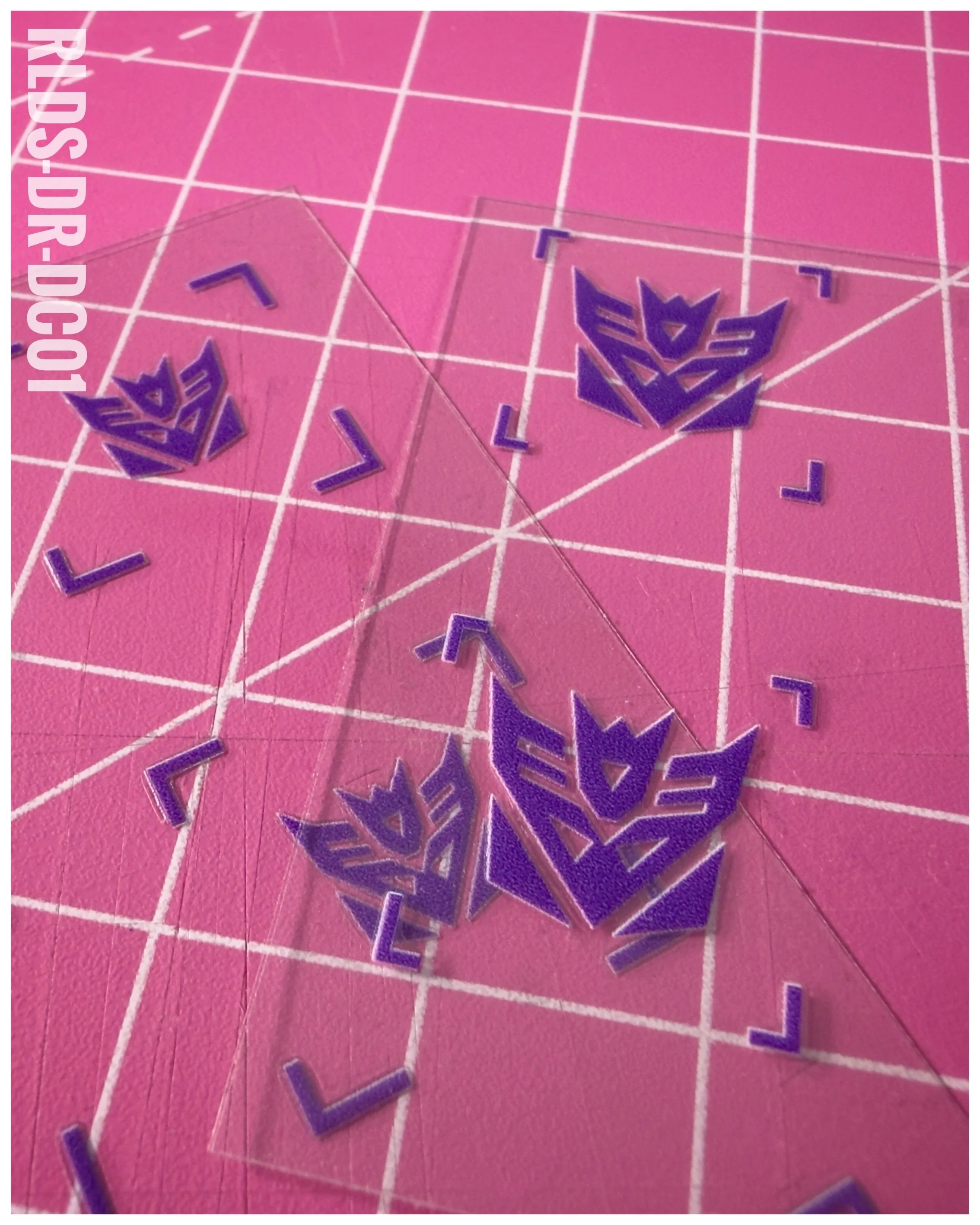 40 x Con UV DTF dry rub transfers, Toon Style, Purple with Clear background.
