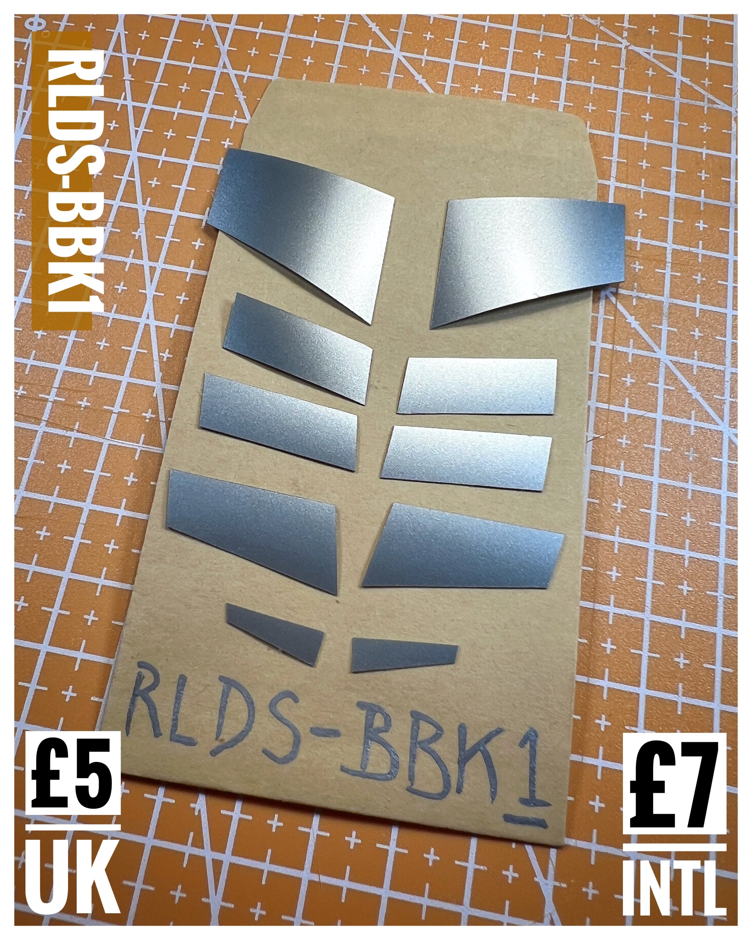 The Bruticus Bling Bundle C (RLDS-BBBC) includes the vinyl sticker sets for the Lord of War combined figure eyes and chest plate.