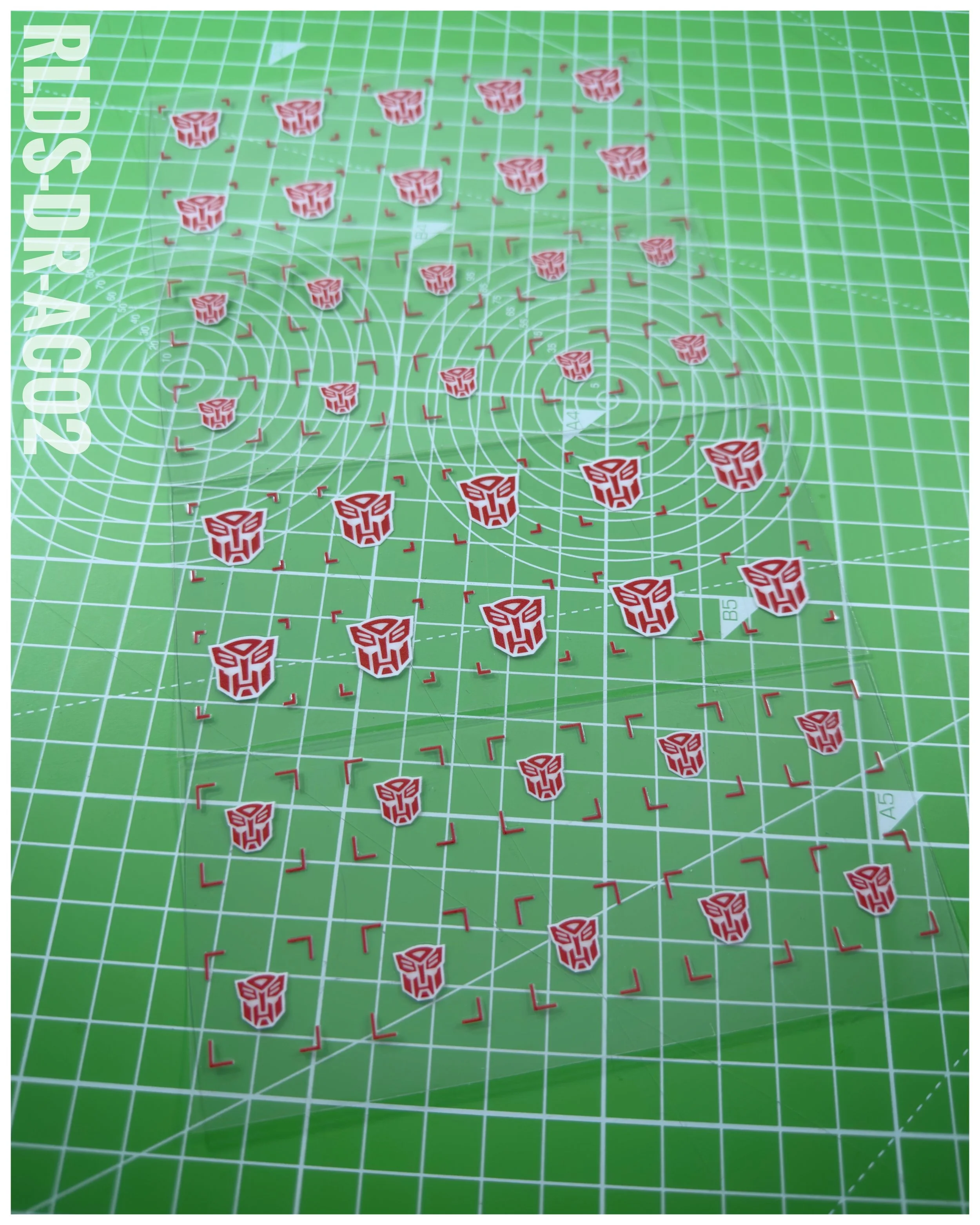 40 x Bot UV DTF dry rub transfers, Toon Style, Red with White background