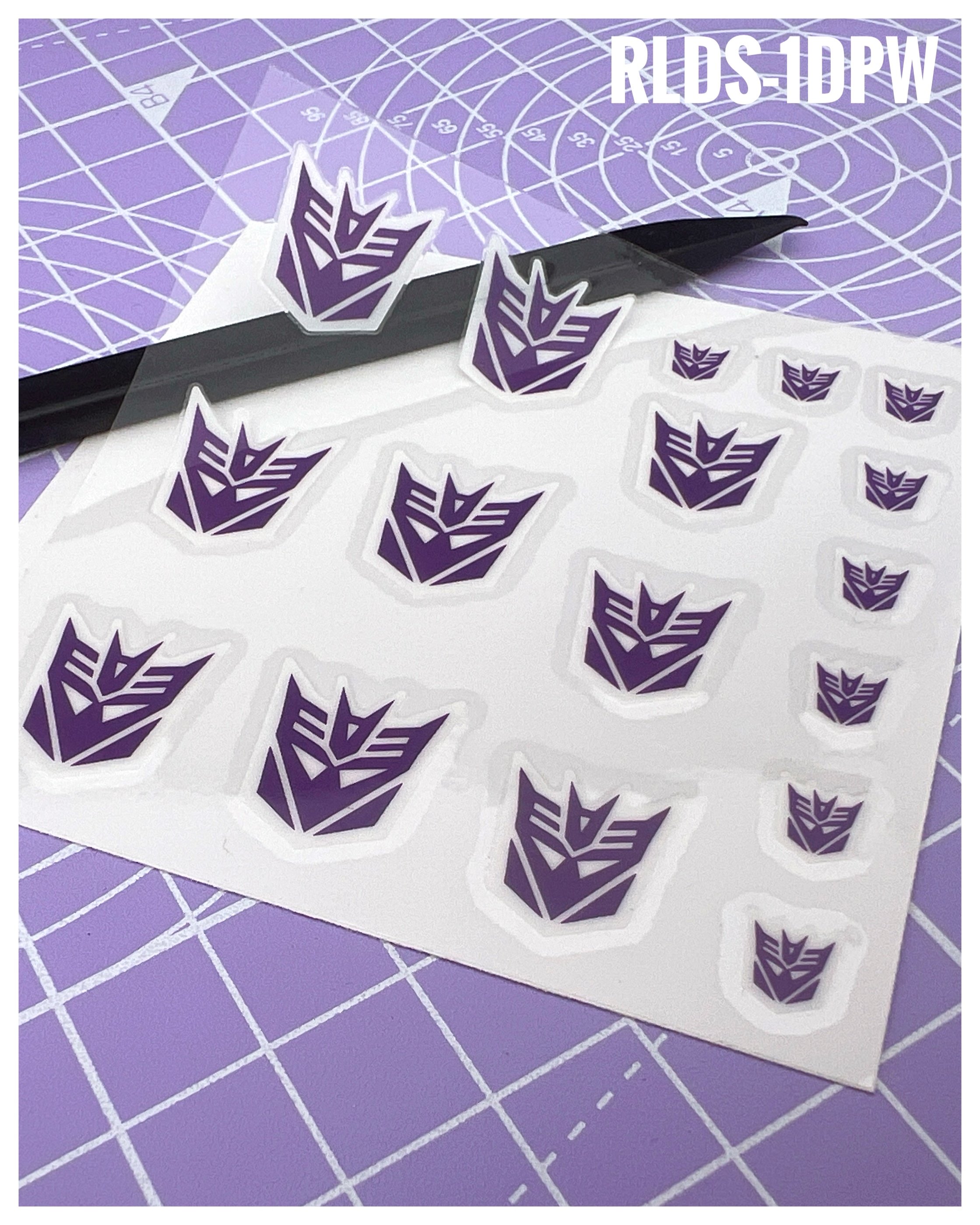 17 x Con dry rub transfers, Purple with White background