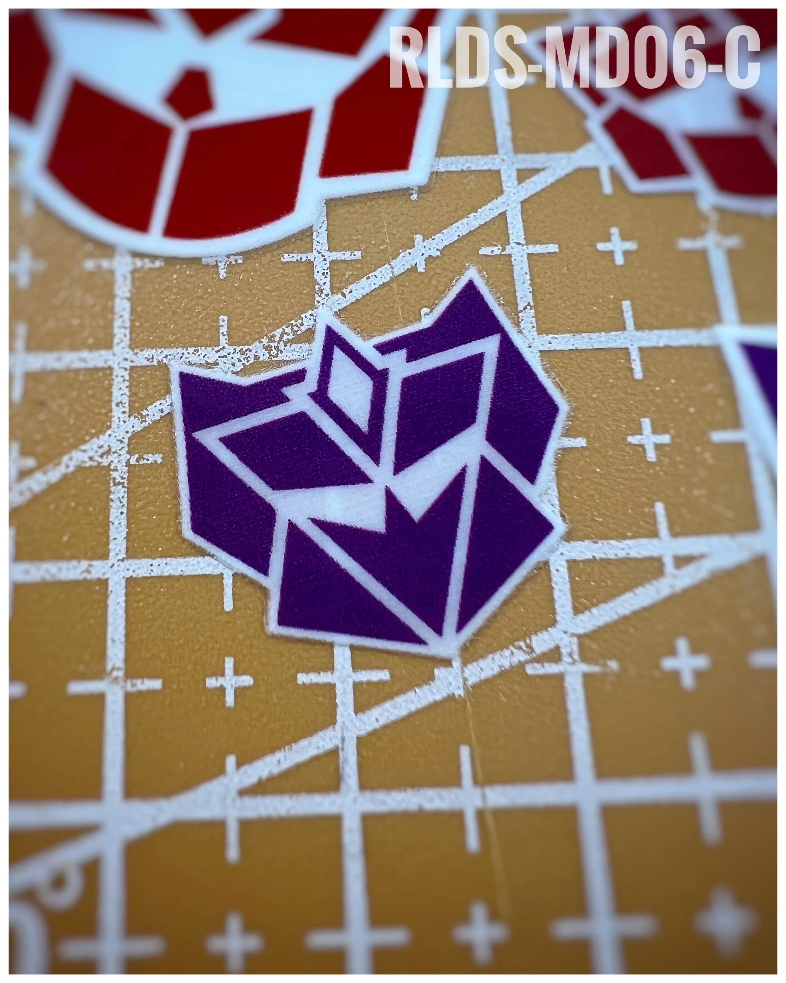 6 x medium G2 Con dry rub transfers, Purple with White background.