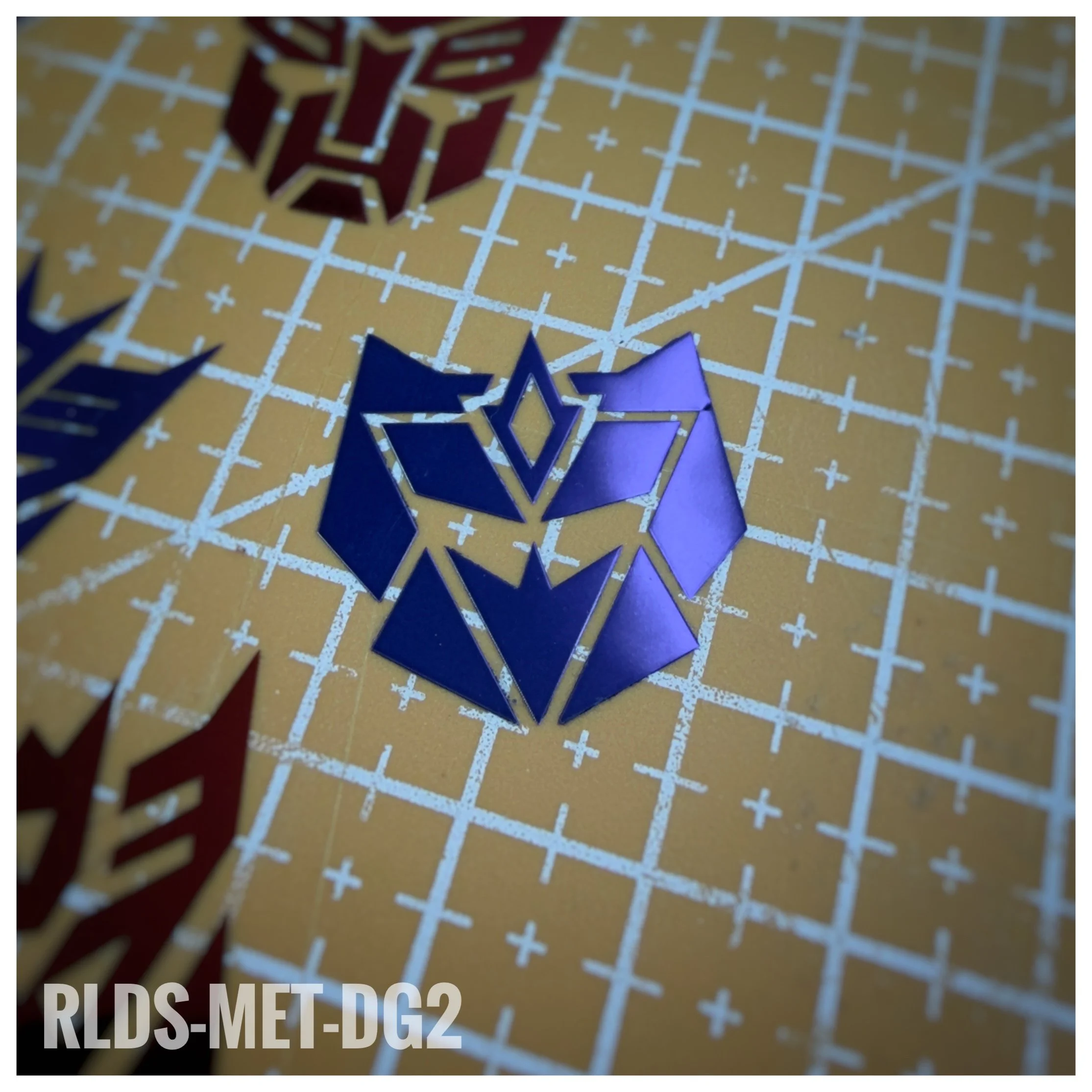4 x Large Metallic G2 Con dry rub transfers, Metallic Purple with Clear background.