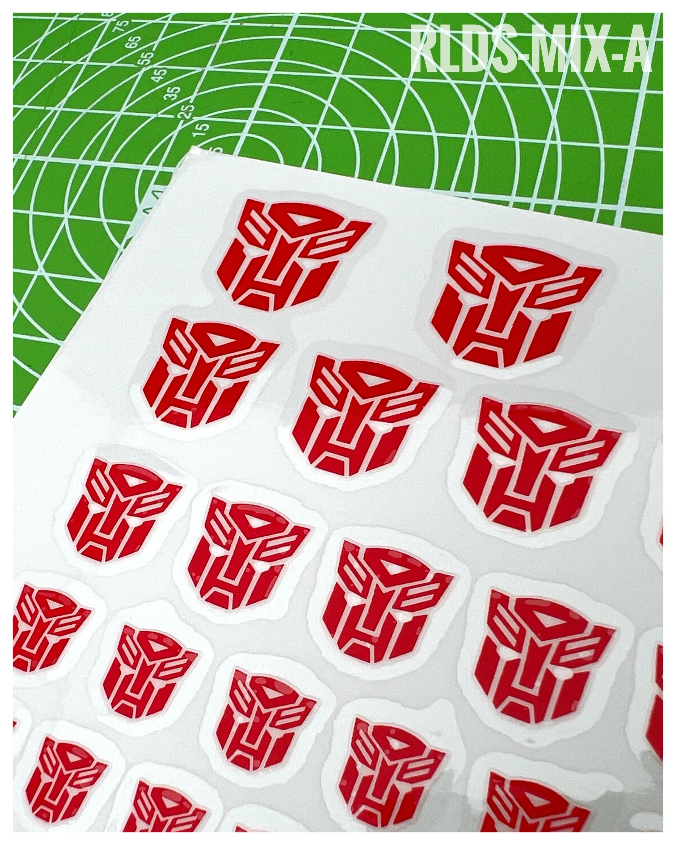 94 x Bot dry rub transfers, including 12 x split logos, Red with Clear background