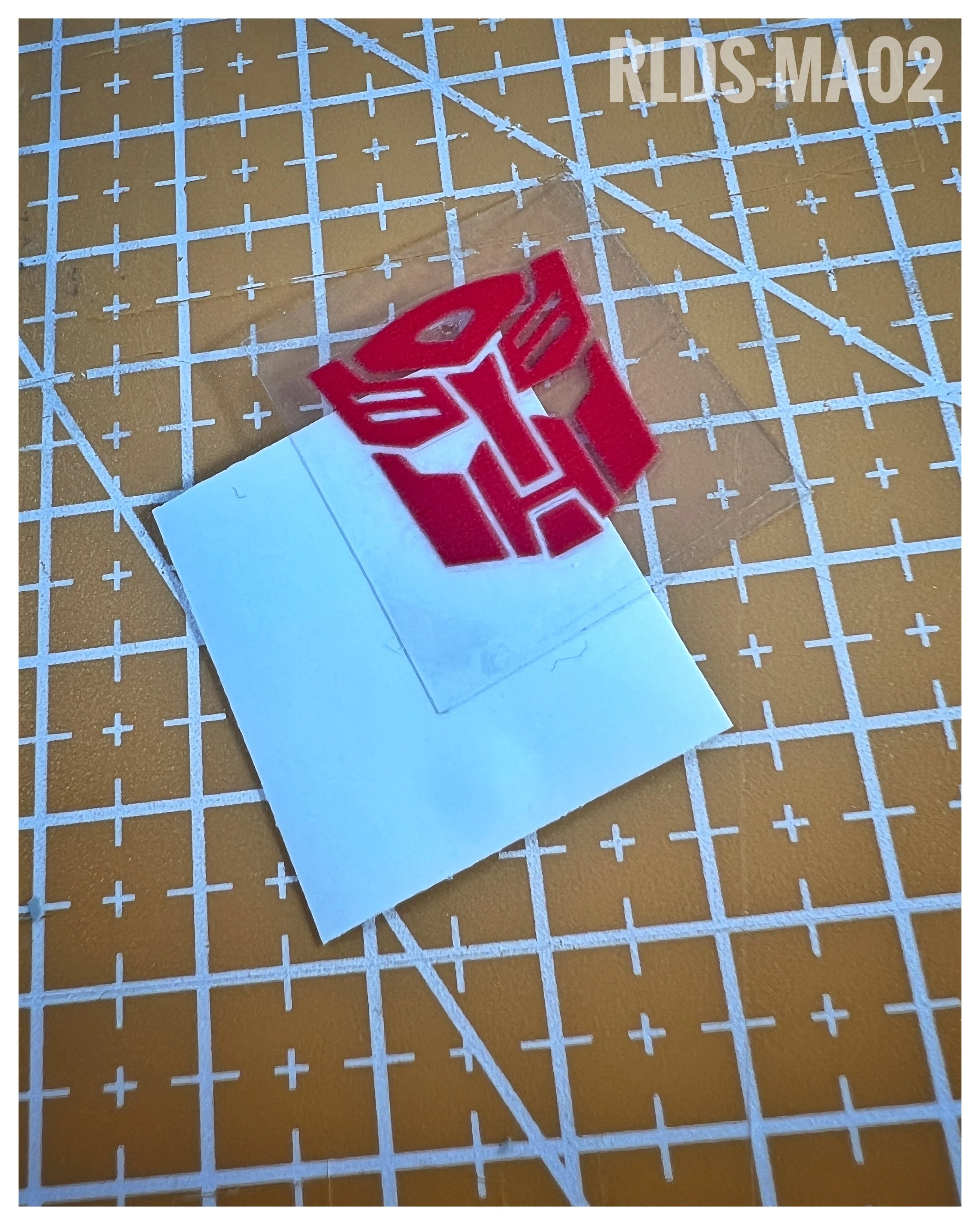 6 x medium 3D/raised toy style Bot dry rub transfers, Red with Clear background.