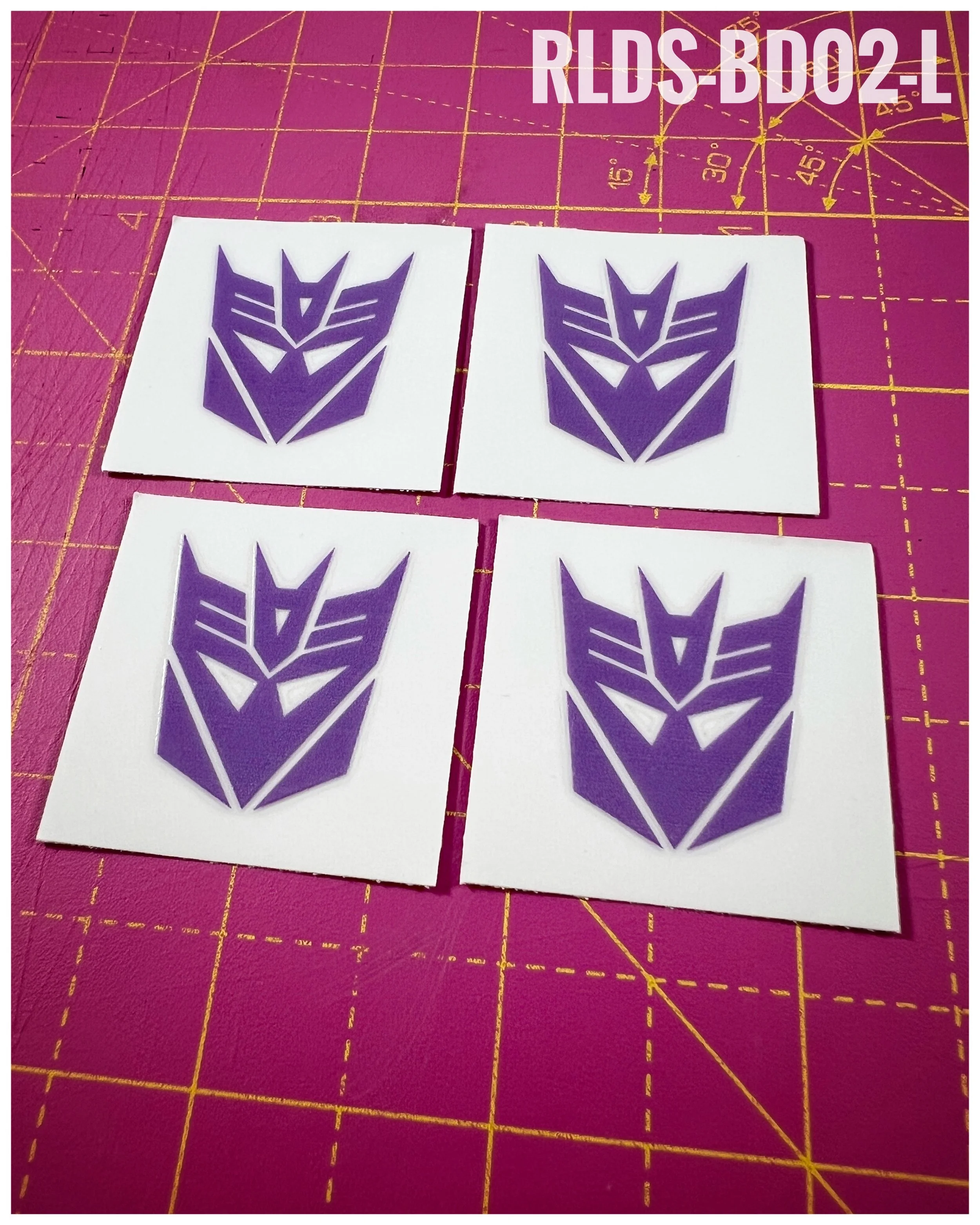 4 x large Con dry rub transfers, Toy style, Light Purple with Clear background.