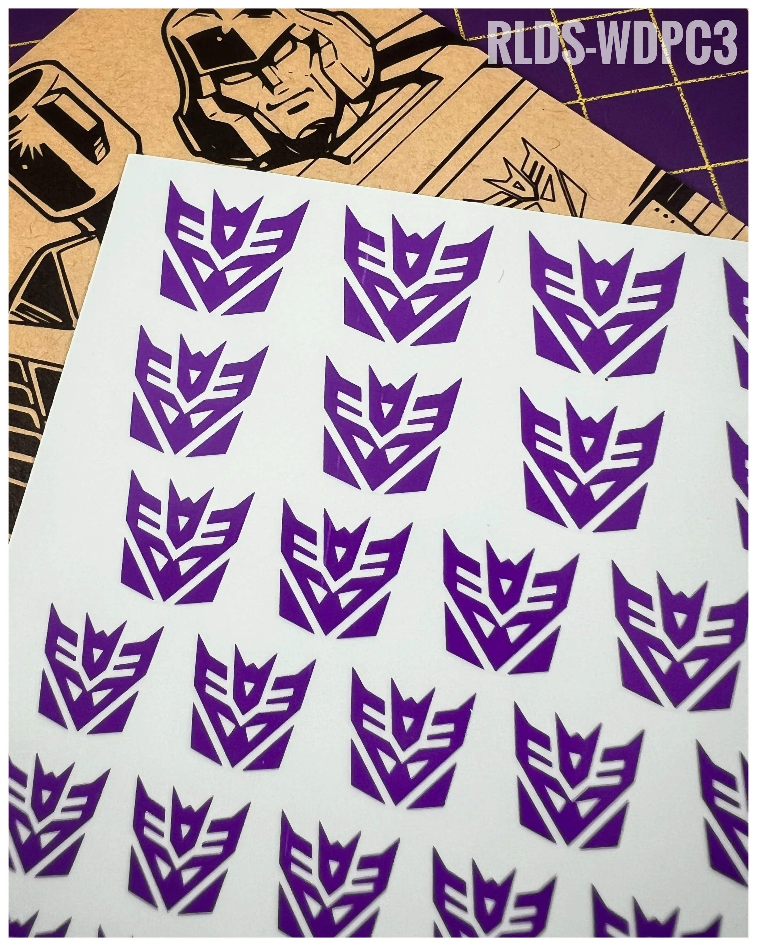 132 x Con Water Slide decals, Purple with Clear background - toon style.