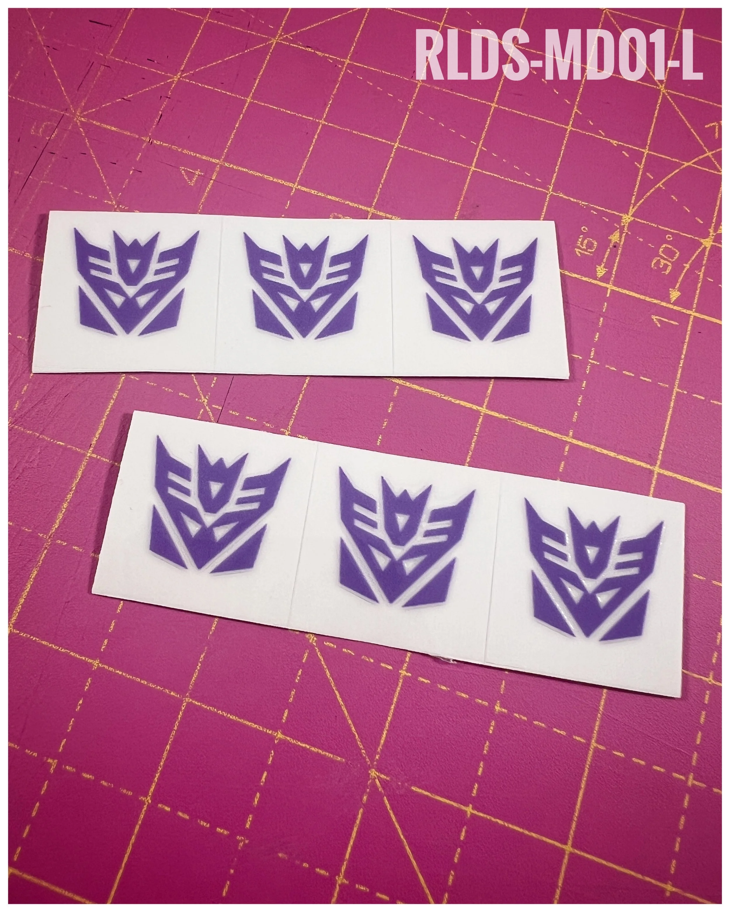 6 x medium toon style Con dry rub transfers, Light Purple with Clear background.