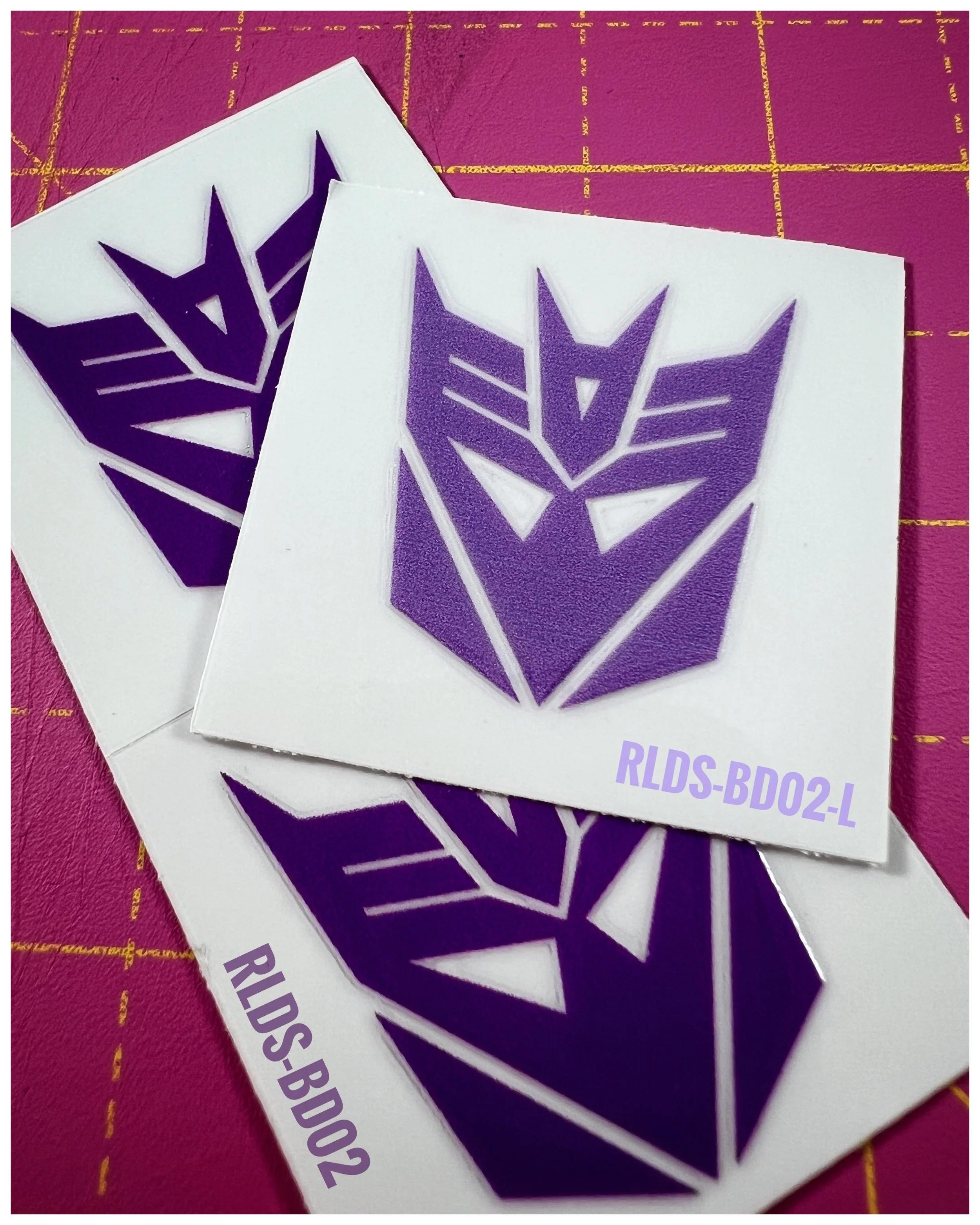 4 x large Con dry rub transfers, Toy style, Light Purple with Clear background.