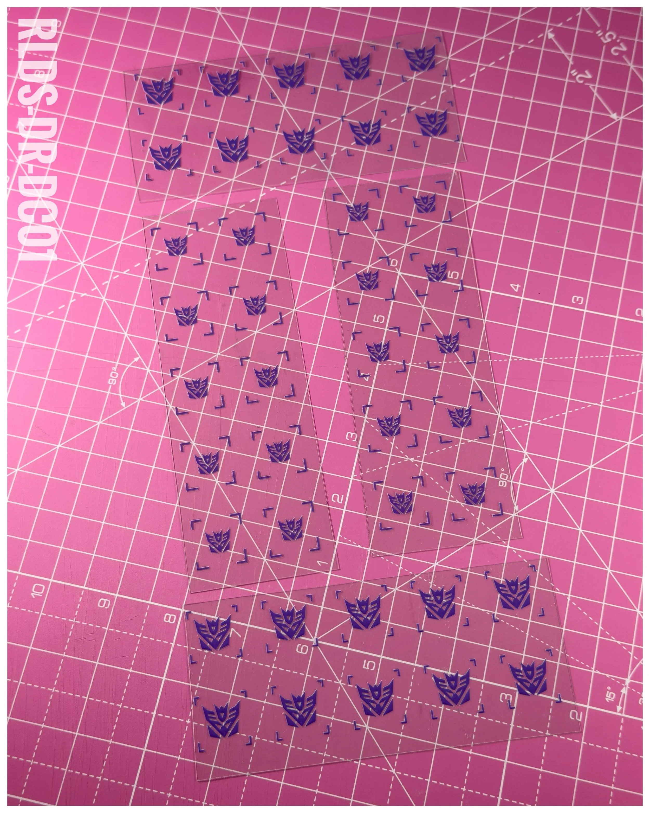 40 x Con UV DTF dry rub transfers, Toon Style, Purple with Clear background.