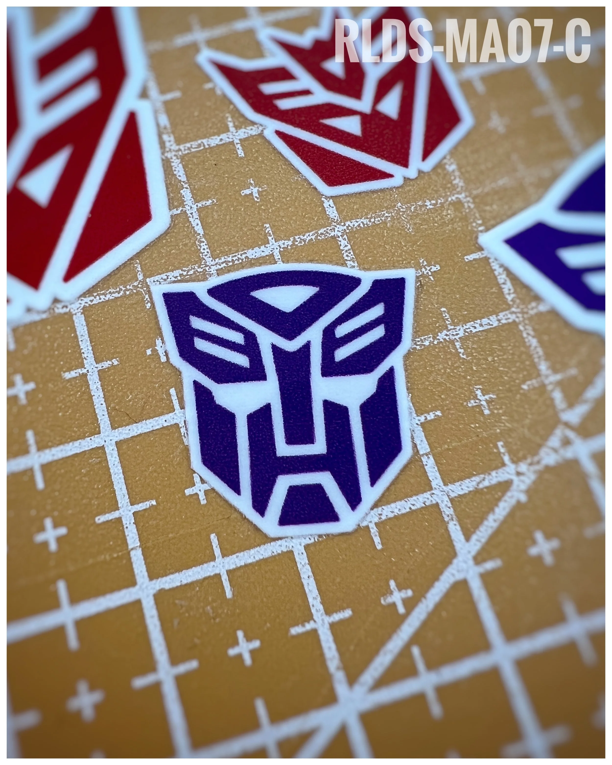 6 x medium Shattered Glass Bot dry rub transfers, Purple with White background.