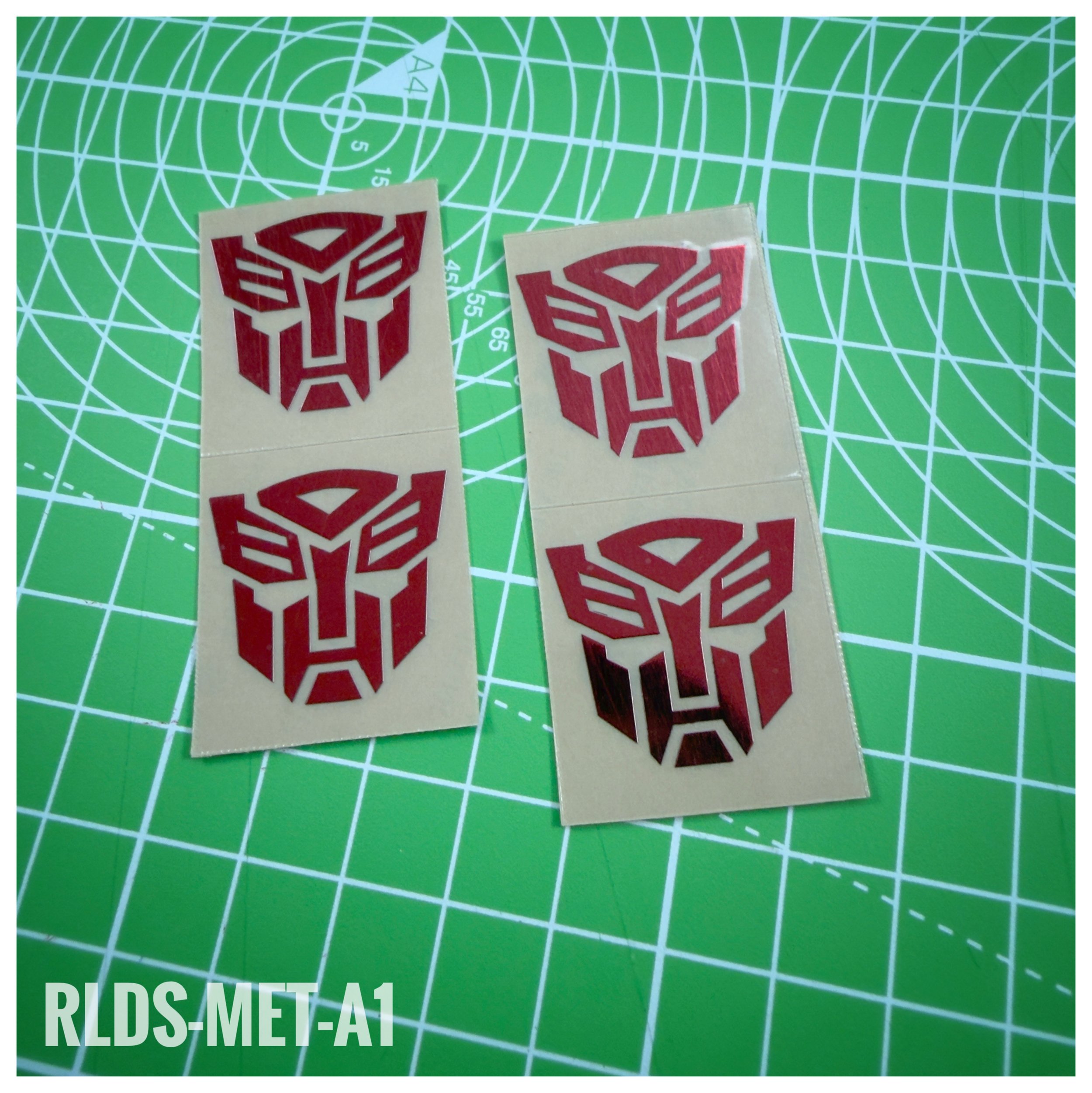 RLDS-MET-A1 - Oversize Metallic Bot Logos, Red on Clear
