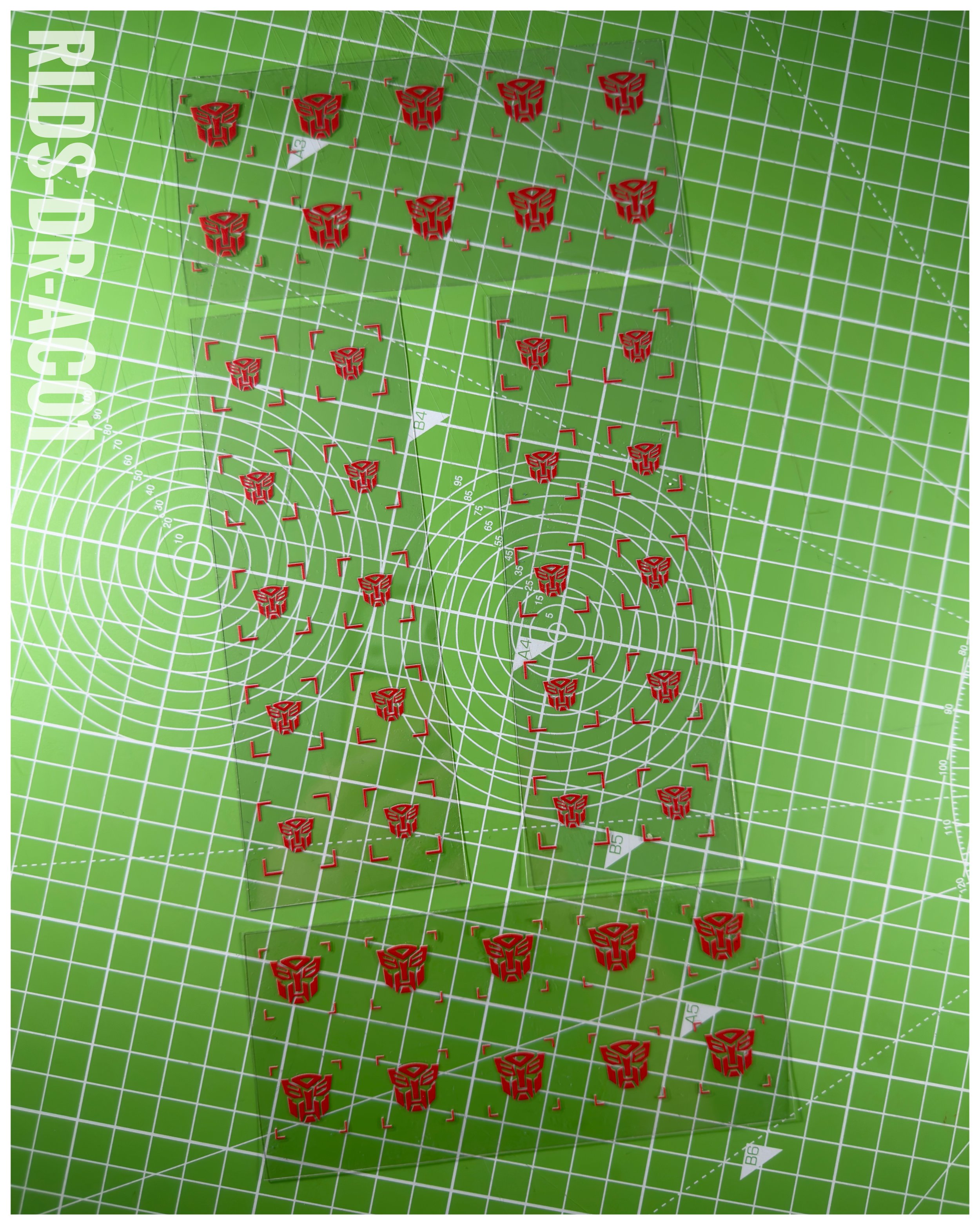 40 x Bot UV DTF dry rub transfers, Toon Style, Red with Clear background.