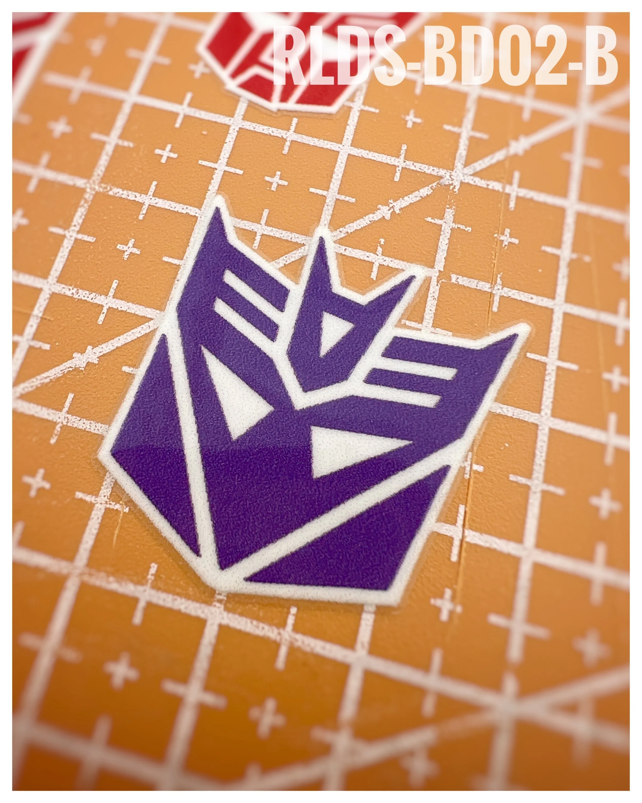 4 x large Con dry rub transfers, Toy style, Purple with White background.
